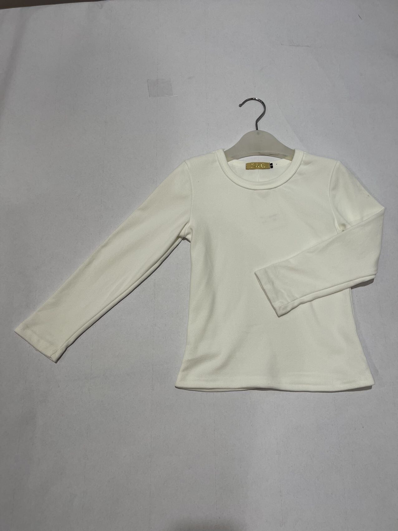 Großhändler CH-123 - unter dem Pullover