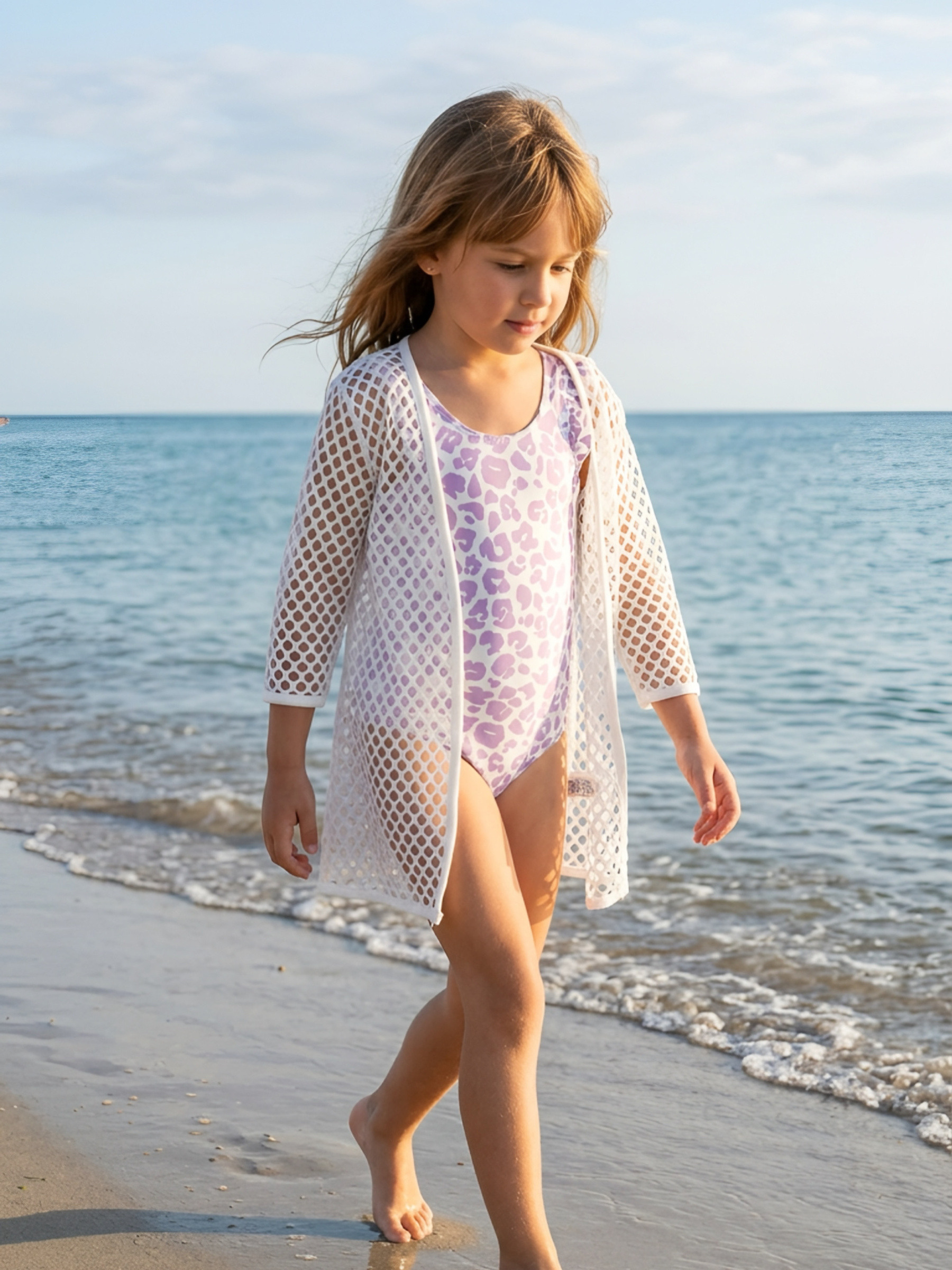 Wholesaler Chicaprie - Girls' one-piece pastel leopard print swimsuit with open back for the beach