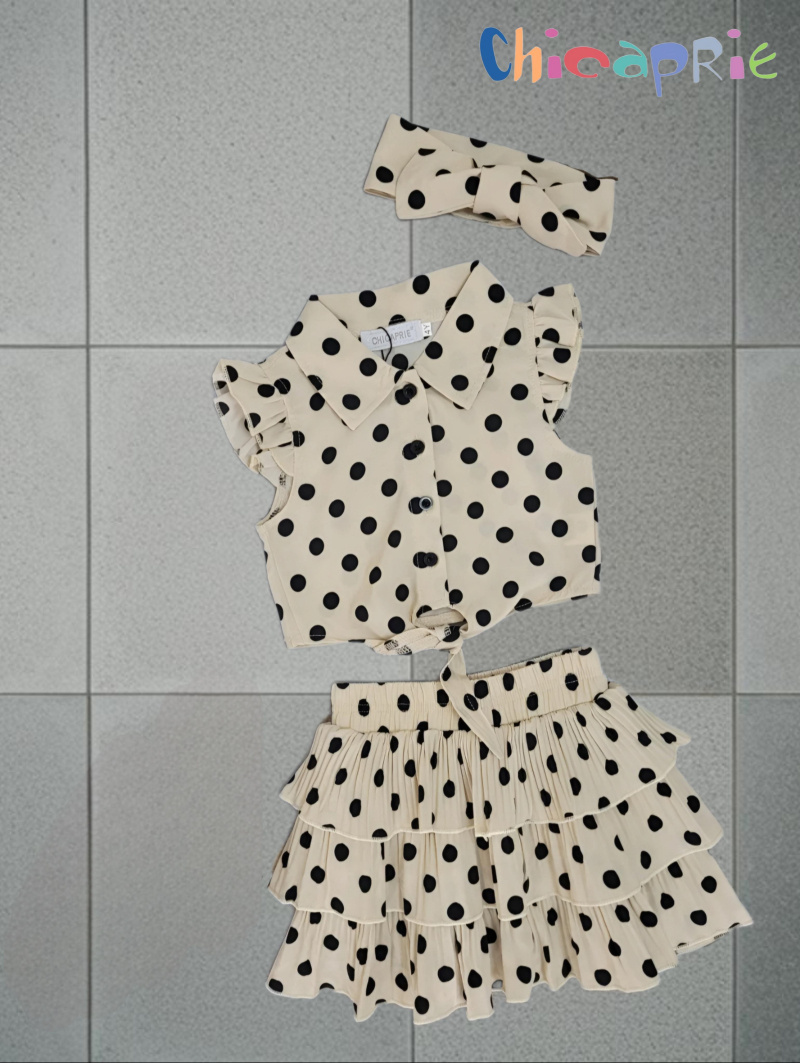 Grossista Chicaprie - Completo per bambina composto da top con fiocco e gonna corta a pieghe con balze a pois