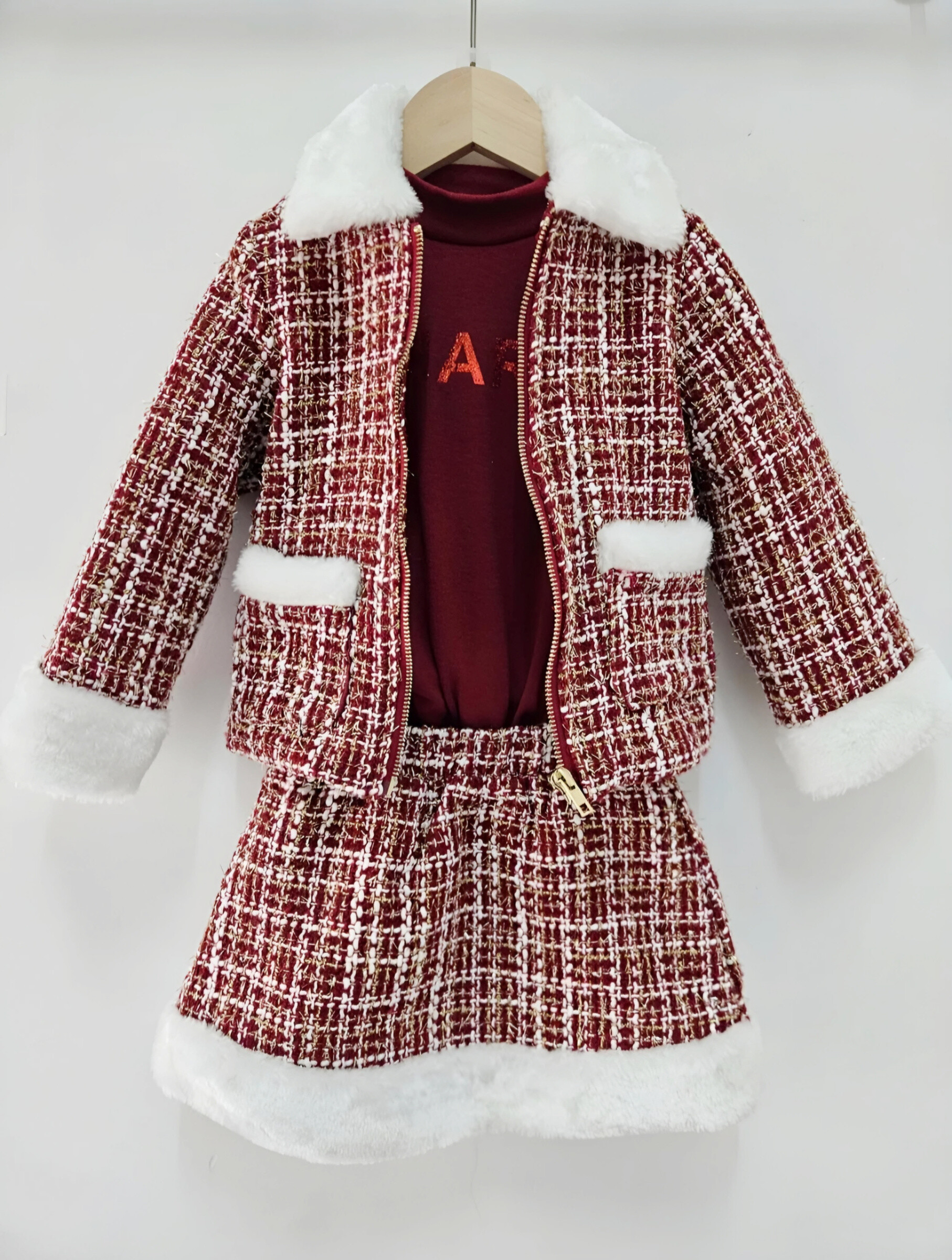 Mayorista Chicaprie - Conjunto festivo para niña compuesto por una chaqueta y falda corta de tweed con detalles de piel sintética y una camiseta lisa
