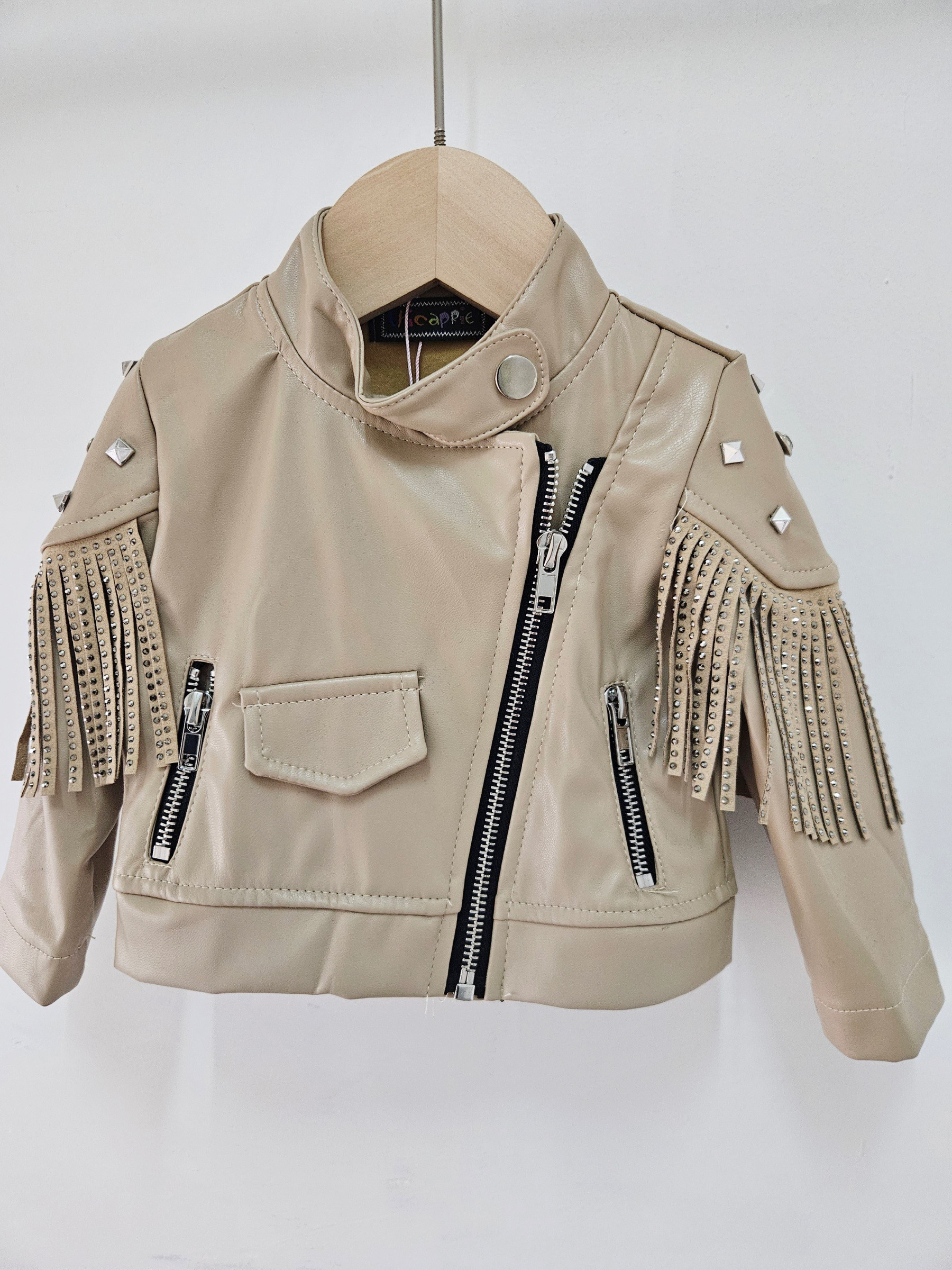 Grossiste Chicaprie - Veste Uni Style Western Simili Cuir Avec Zip En Biais Et Franges Bébé Fille