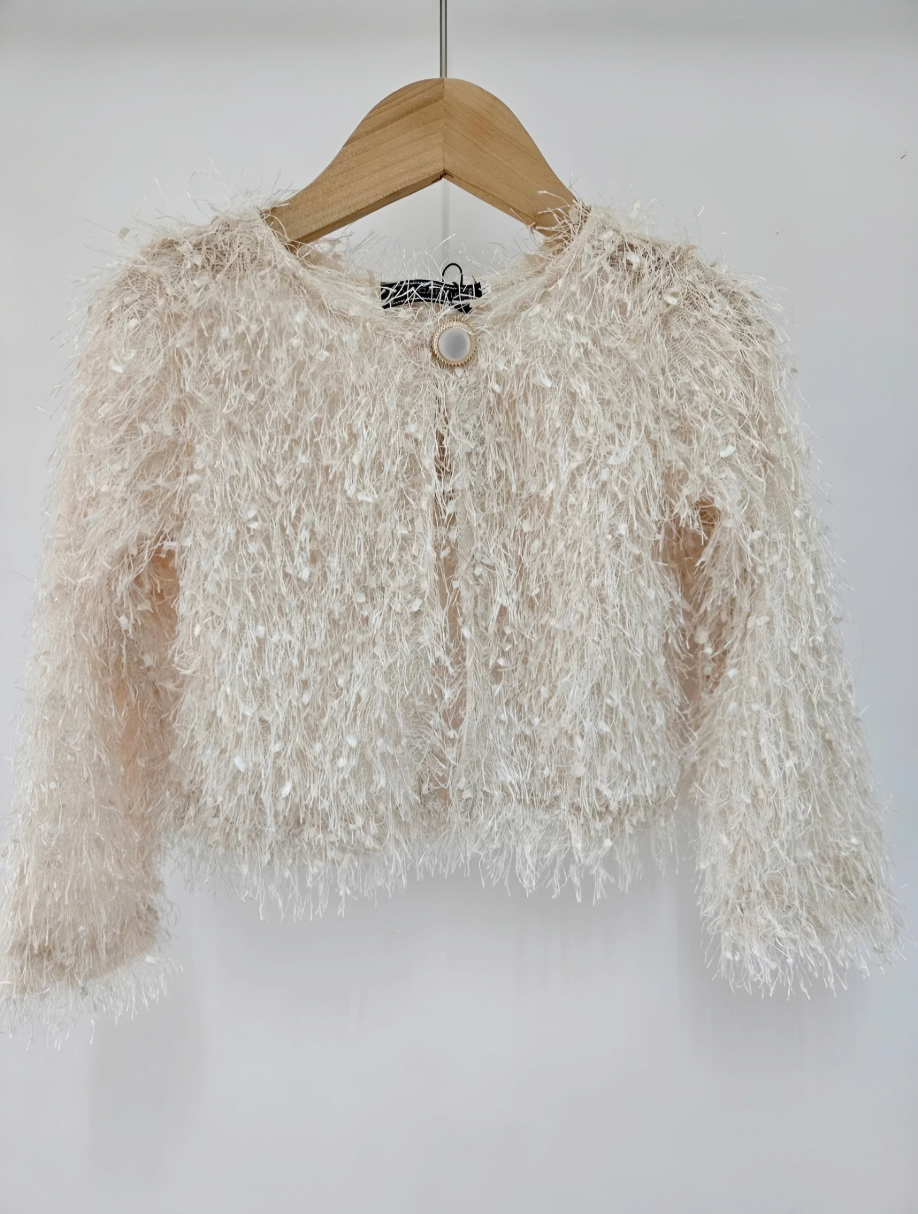 Großhändler Chicaprie - Langärmeliger Bolero-Cardigan aus Kunstfell mit Fransen und Knopf für Mädchenparty