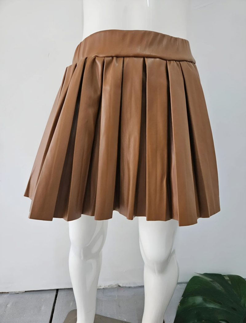 Grossiste Chicaprie - Jupe Courte Plissée Unie Simili Cuir Fille