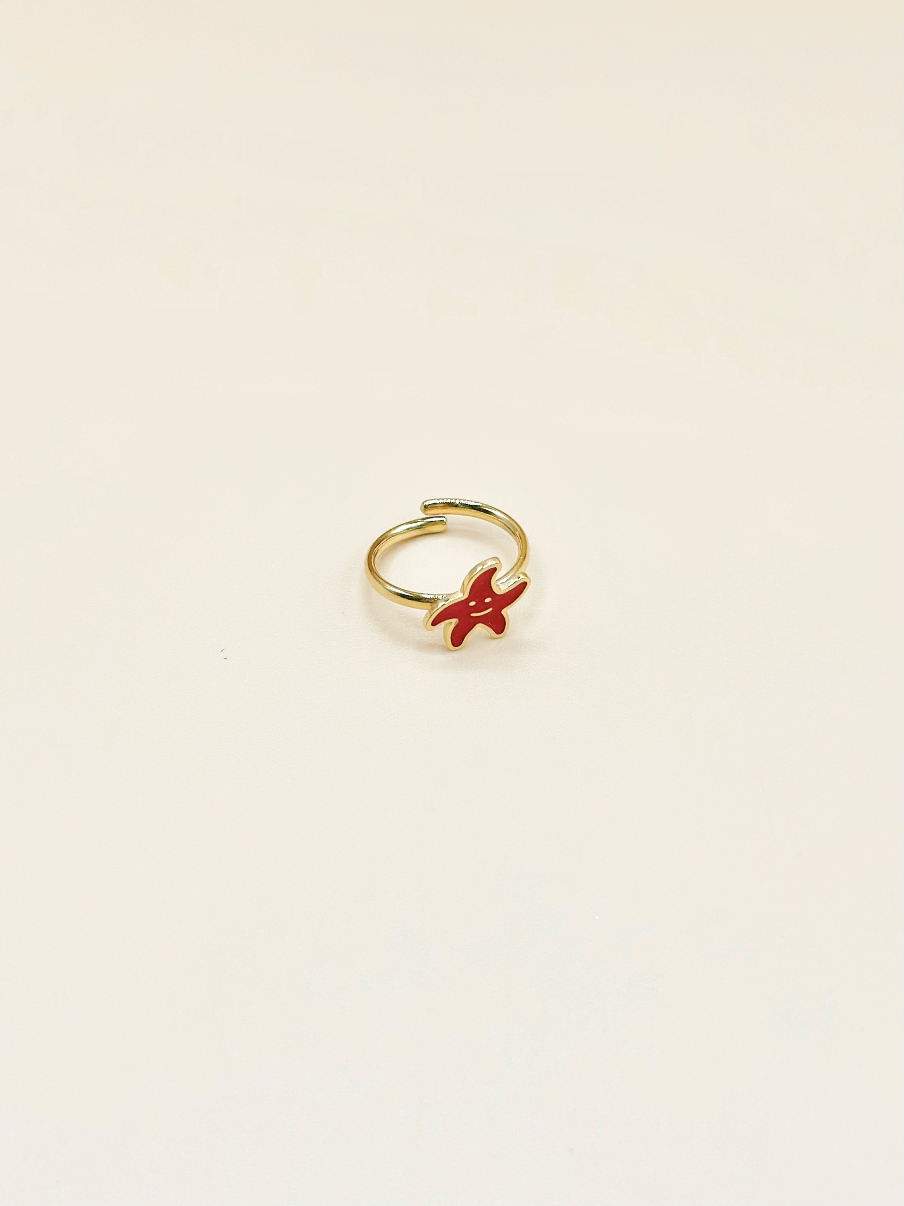 Grossiste Emily - Bague ajustable pour enfant en acier inoxydable doré Etoile de Mer