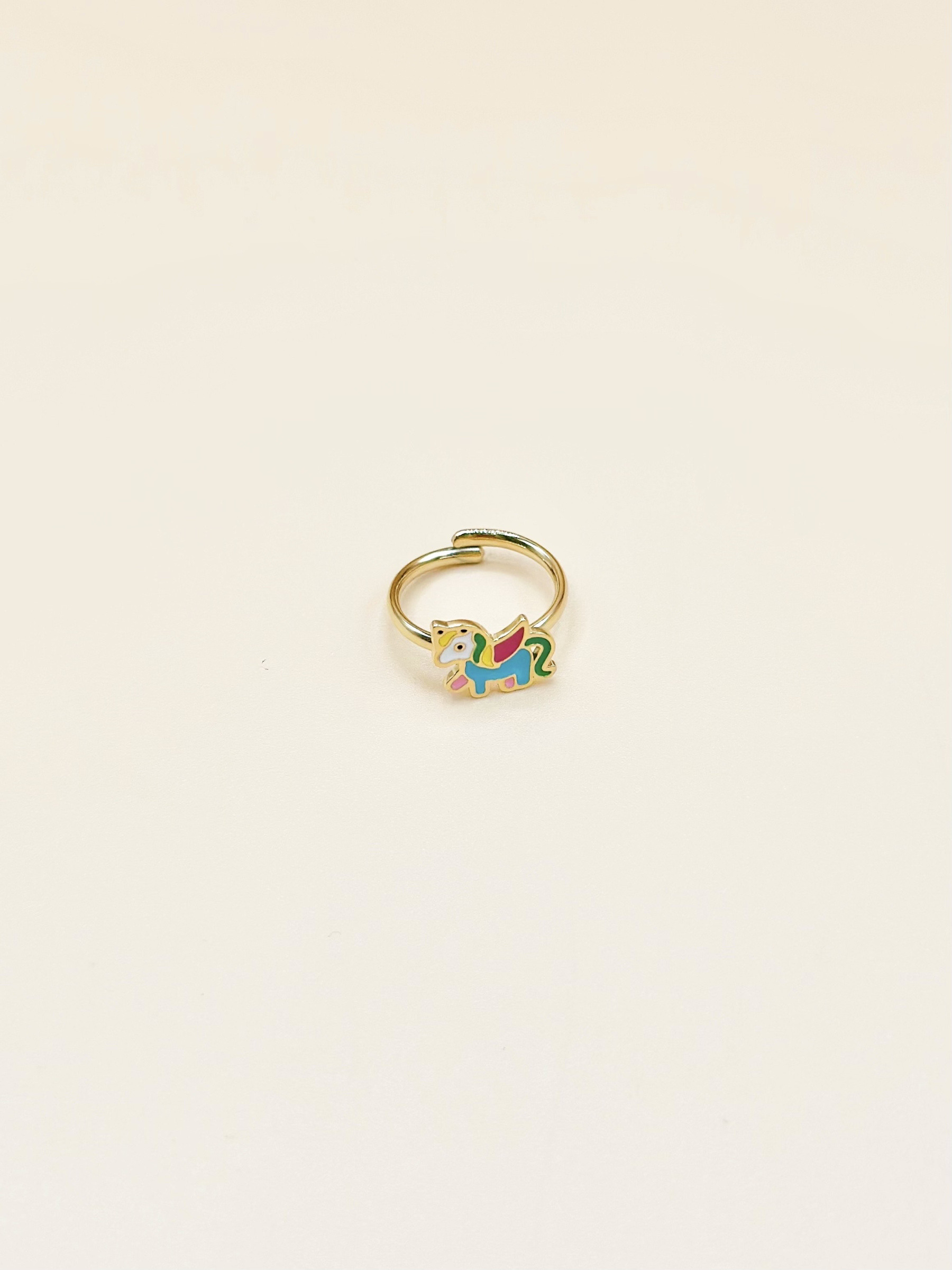 Grossiste Emily - Bague ajustable enfant en acier inoxydable doré Licorne
