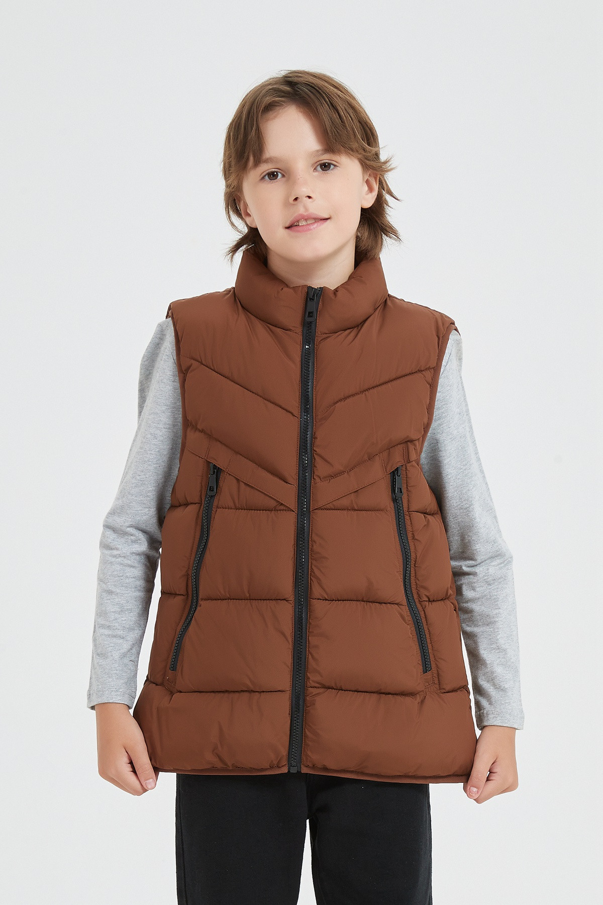 Grossiste KYMAXX - Doudoune enfant bicolore sans manches avec capuche