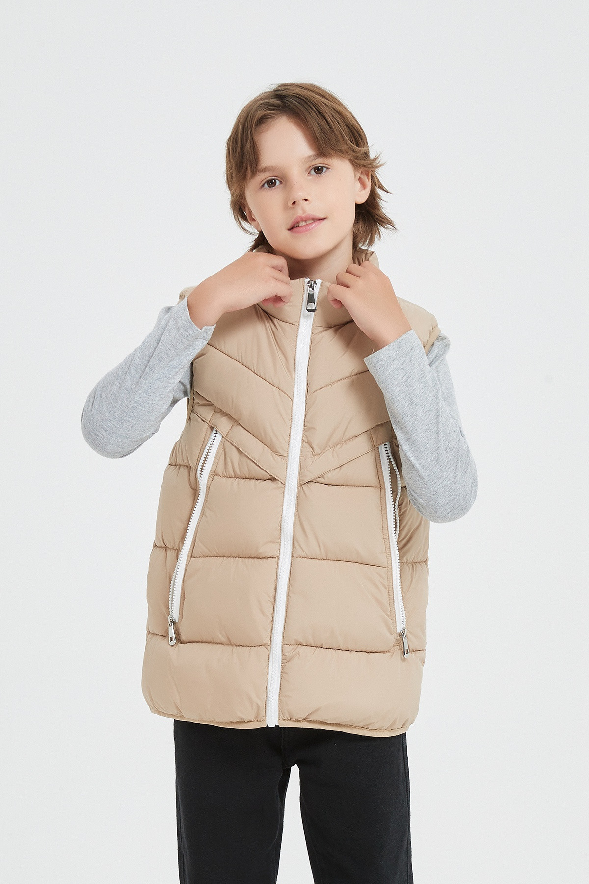 Grossiste KYMAXX - Doudoune enfant bicolore sans manches avec capuche