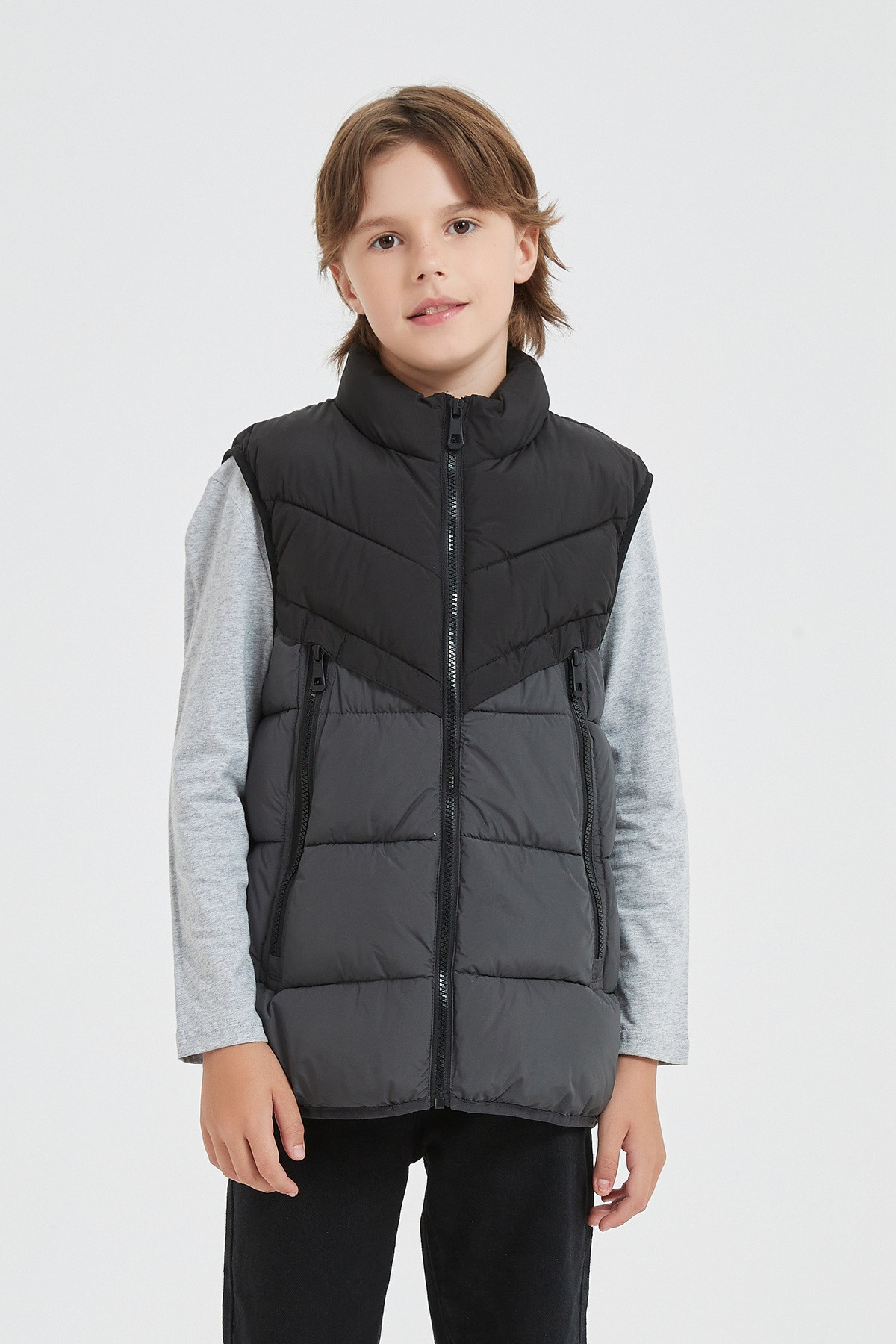 Grossiste KYMAXX - Doudoune enfant bicolore sans manches avec capuche