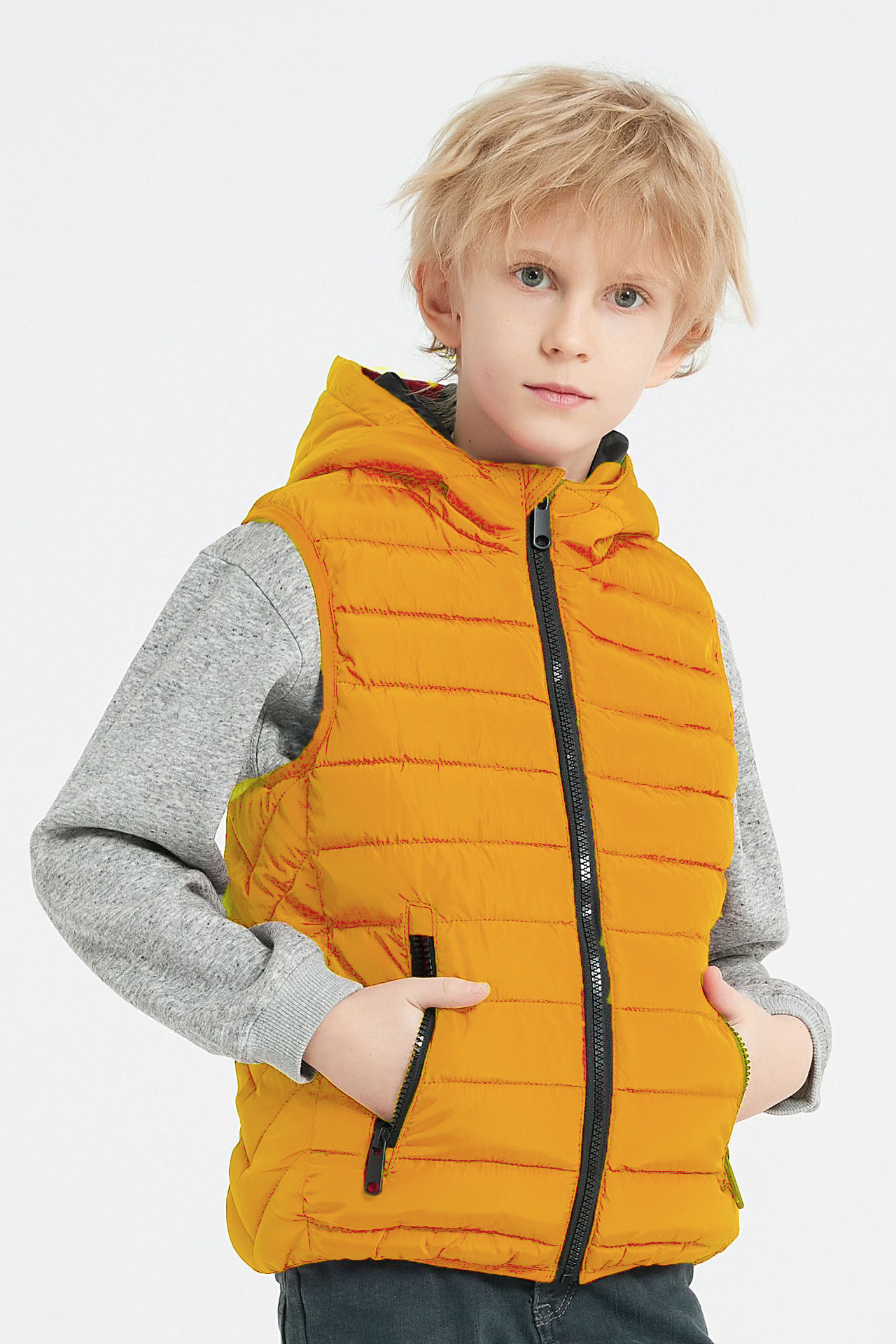 Grossiste KYMAXX - Doudoune enfant unie sans manches avec capuche