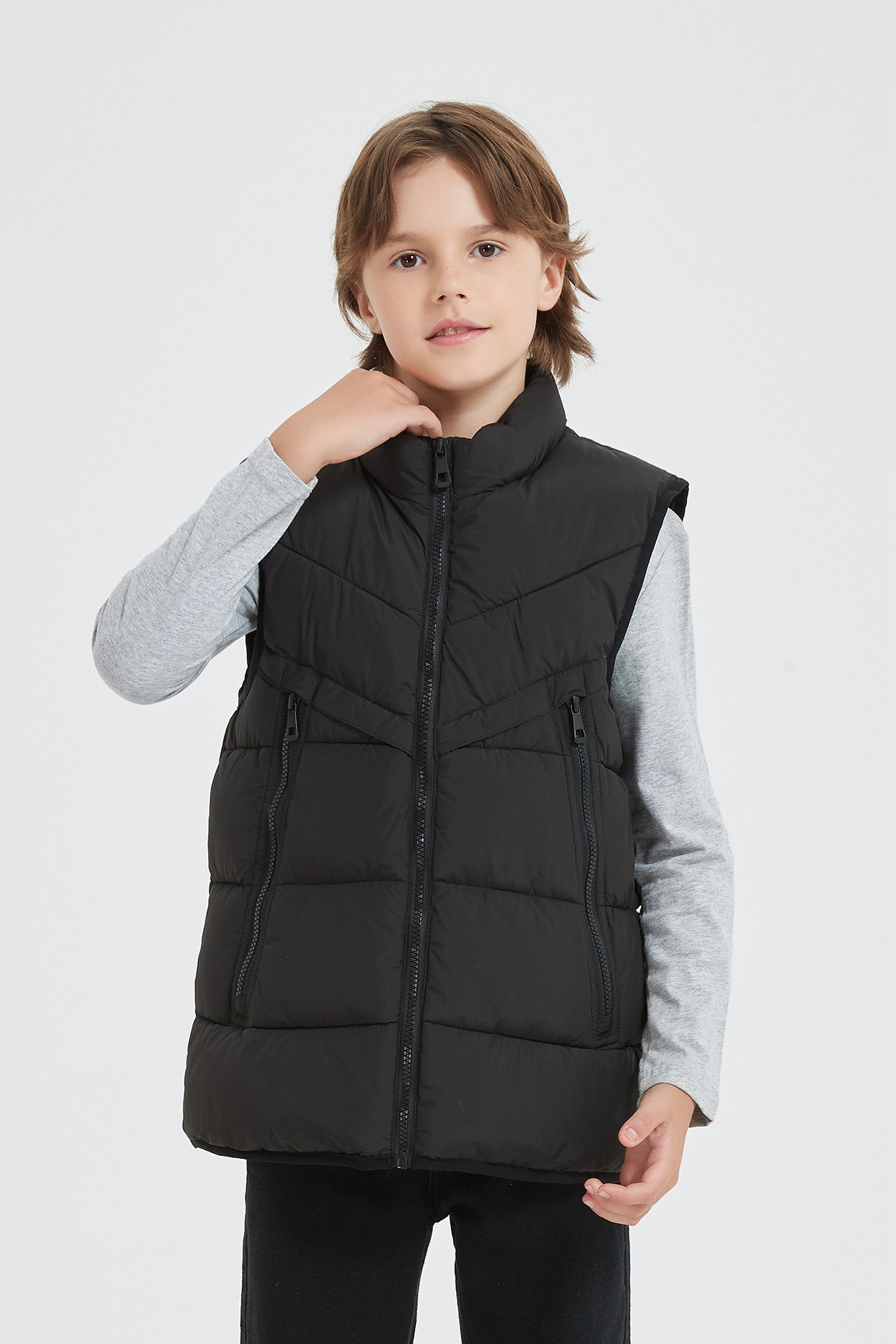 Grossiste KYMAXX - Doudoune enfant bicolore sans manches avec capuche