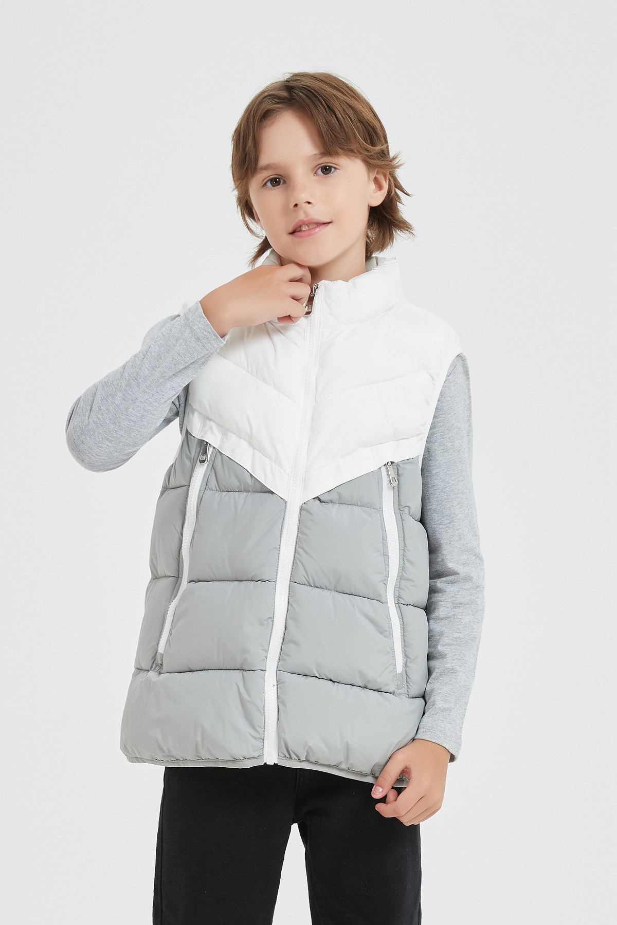 Grossiste KYMAXX - Doudoune enfant bicolore sans manches avec capuche