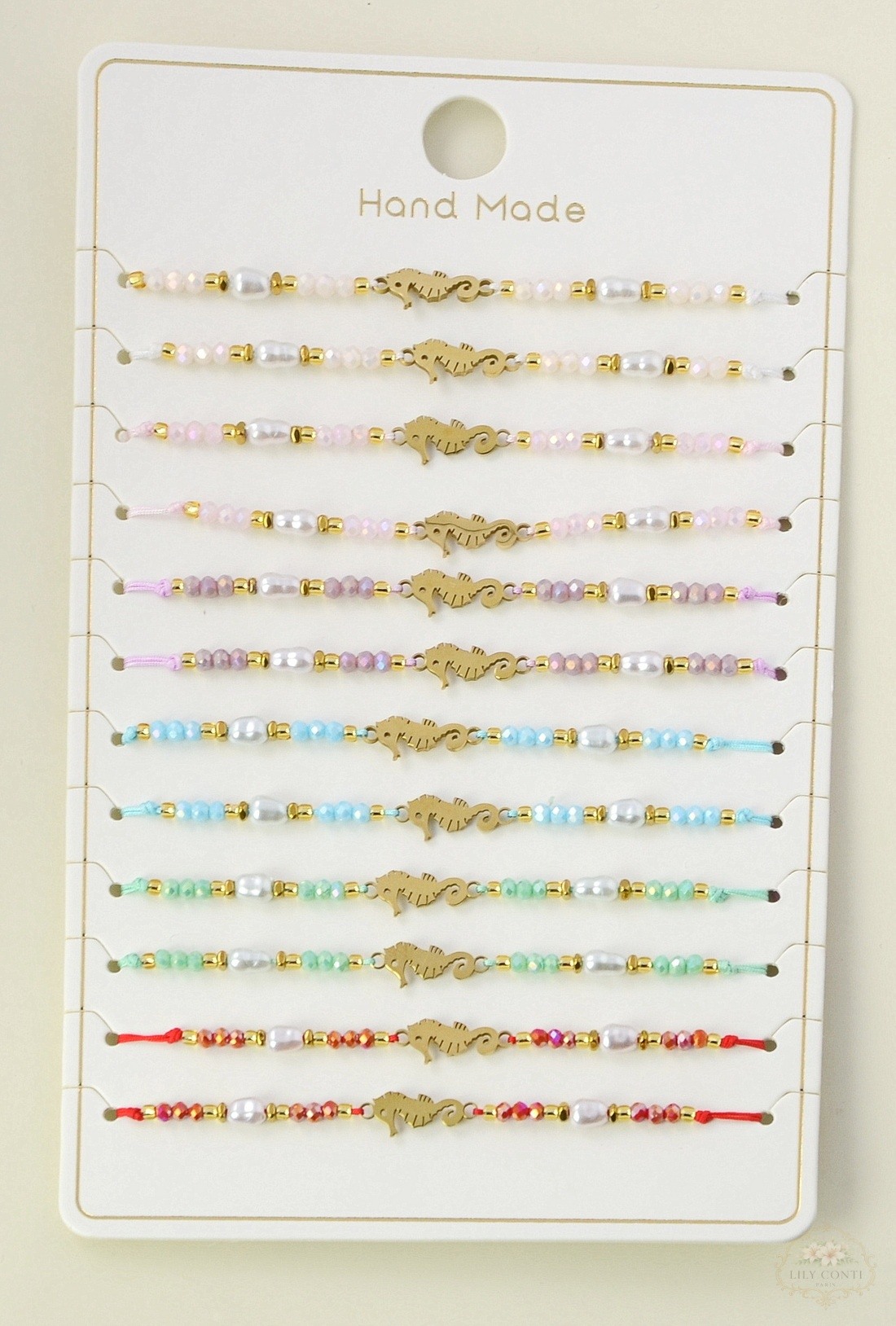 Grossiste LILY CONTI - Lot de 12 bracelets enfant réglables coulissants – motif hippocampe en acier inoxydable