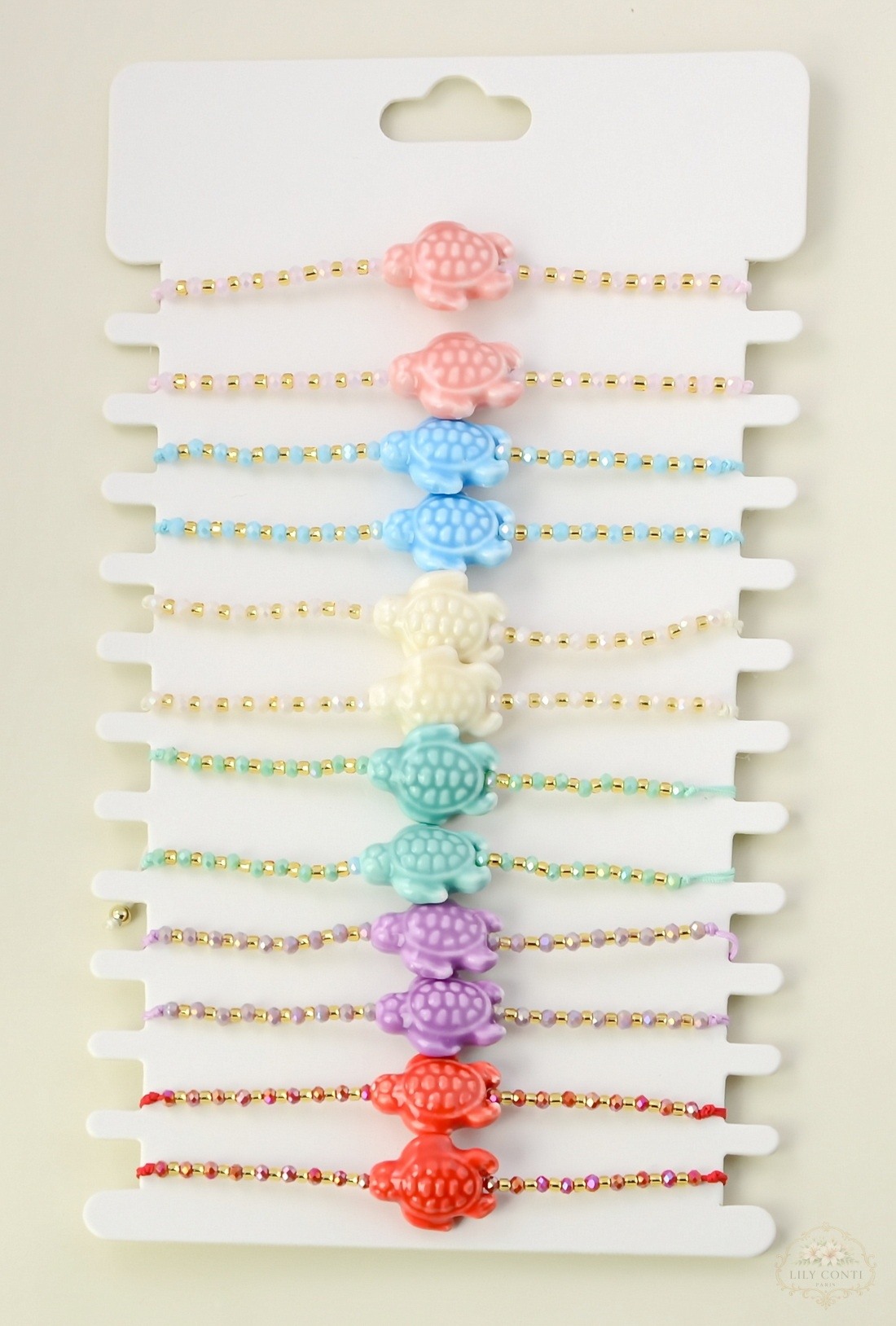 Grossista LILY CONTI - Set di 12 braccialetti per bambini regolabili scorrevoli – motivo tartaruga
