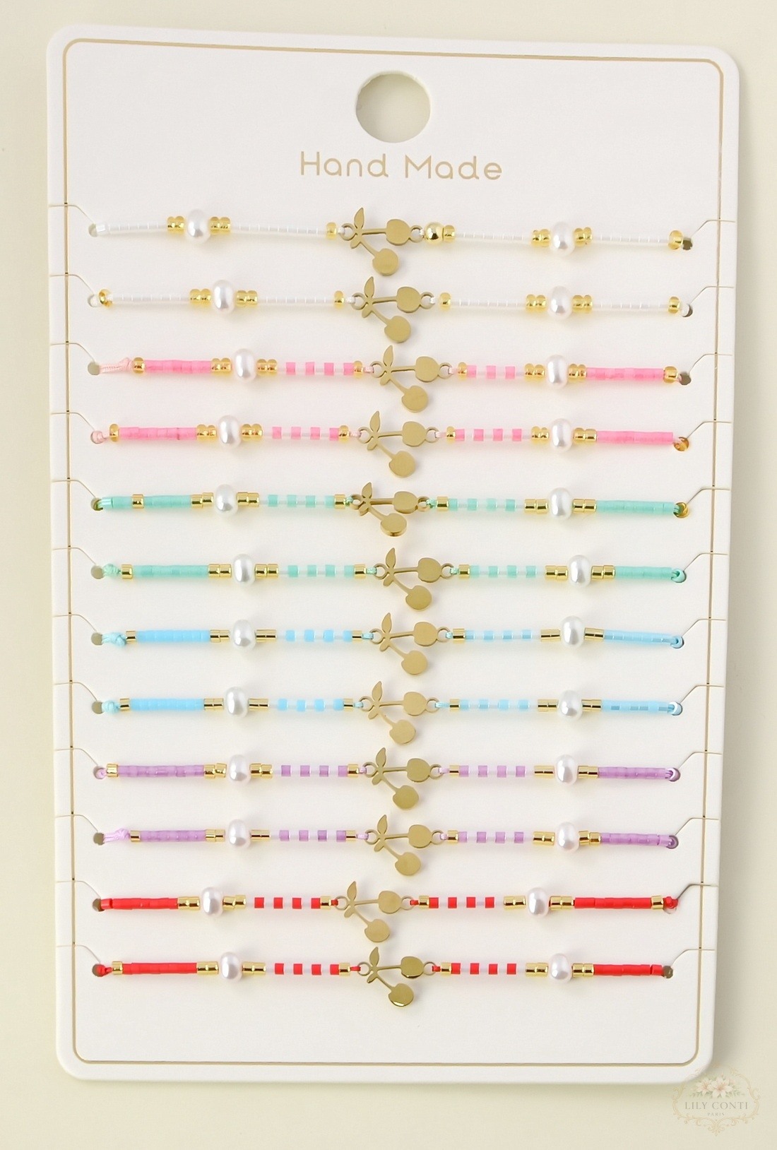 Grossista LILY CONTI - Set di 12 braccialetti per bambini regolabili scorrevoli – motivo ciliegia in acciaio inossidabile