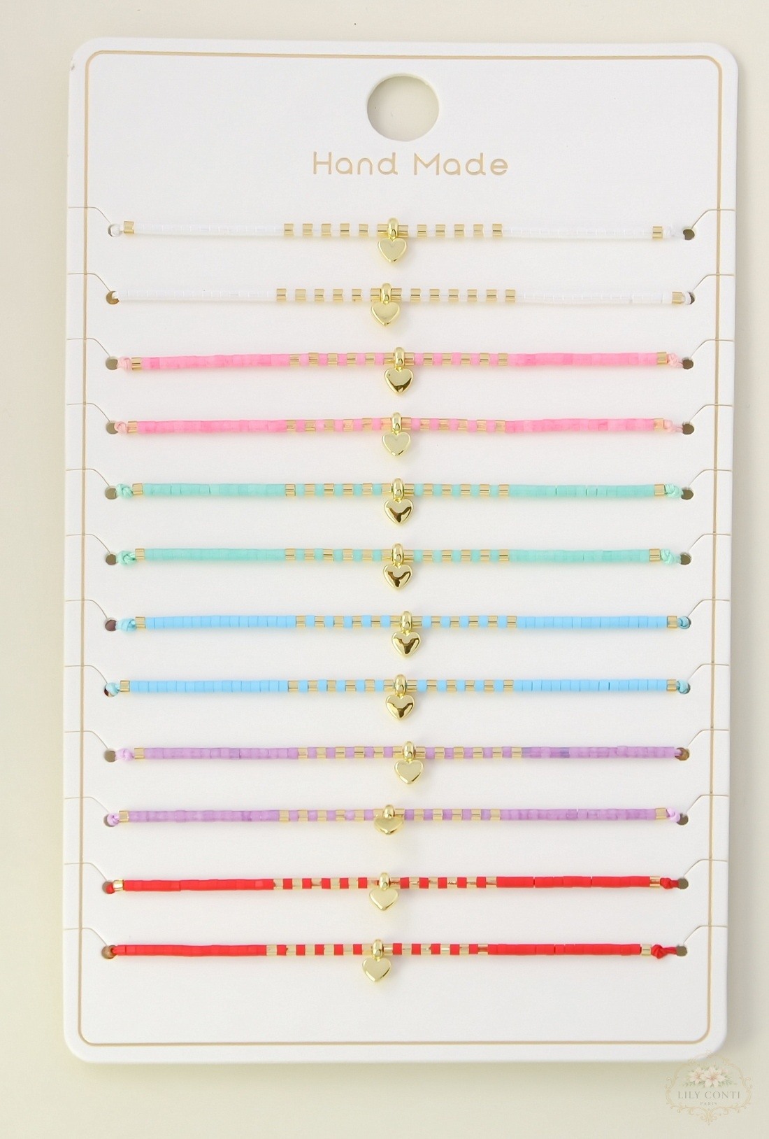 Wholesaler LILY CONTI - Set of 12 adjustable sliding children's bracelets – heart pendant