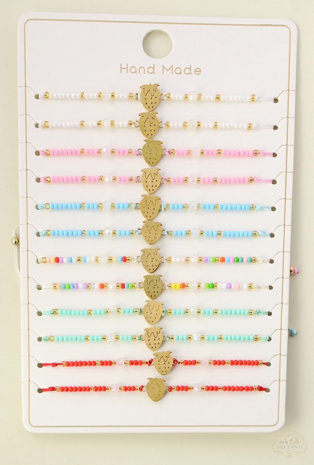 Wholesaler LILY CONTI - Set of 12 adjustable sliding children's bracelets – strawberry design in stainless steel