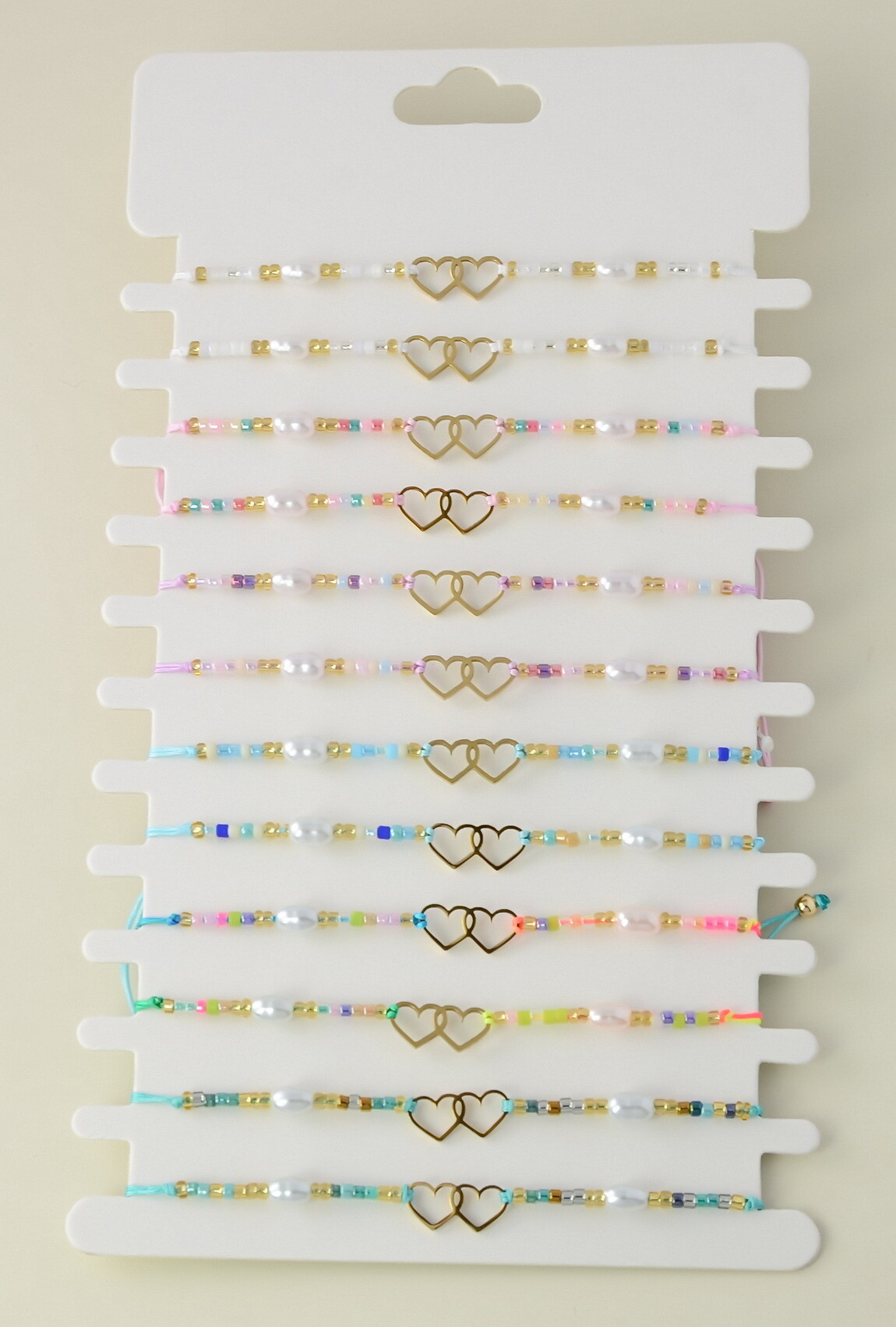 Großhändler LILY CONTI - Set aus 12 verstellbaren Armbändern aus vergoldetem Edelstahl und Rocailles-Perlen