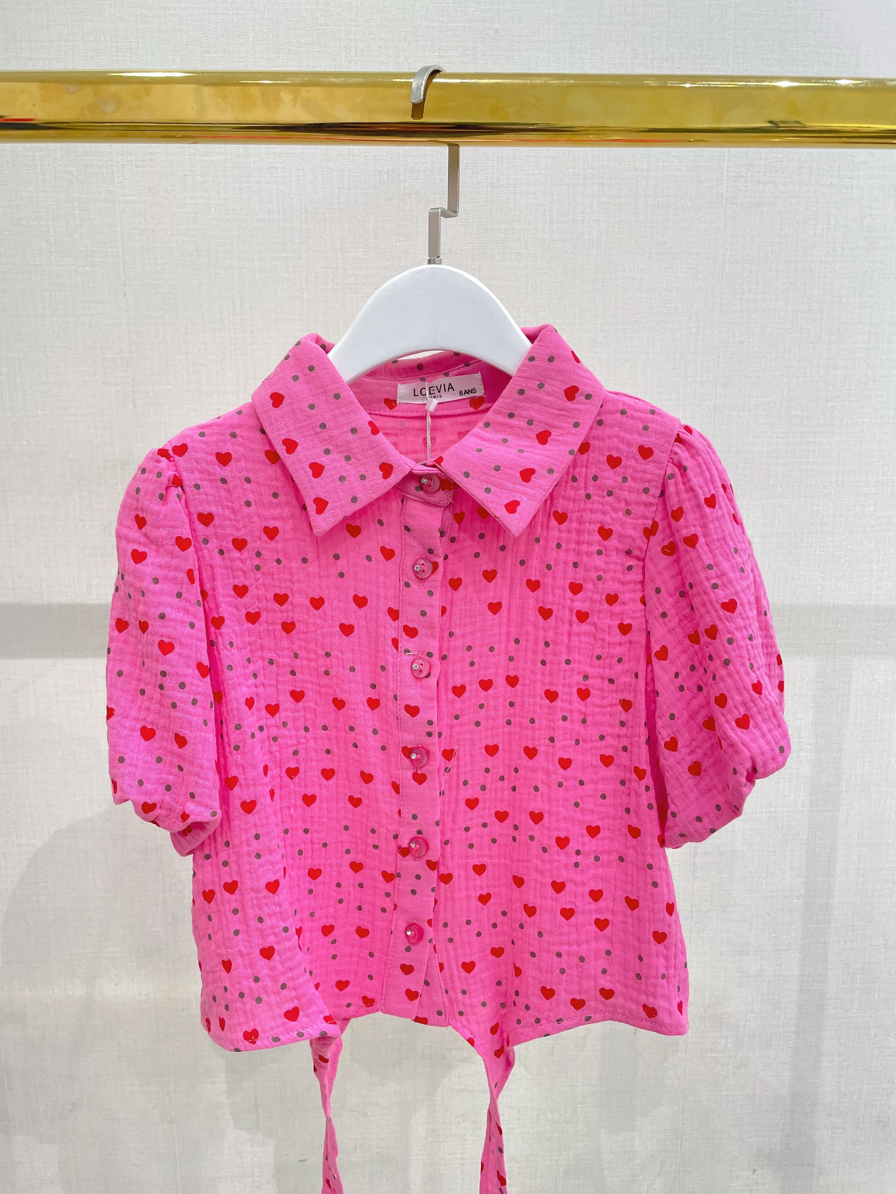 Grossiste LOEVIA - Chemise à manches courtes fillette motif cœurs