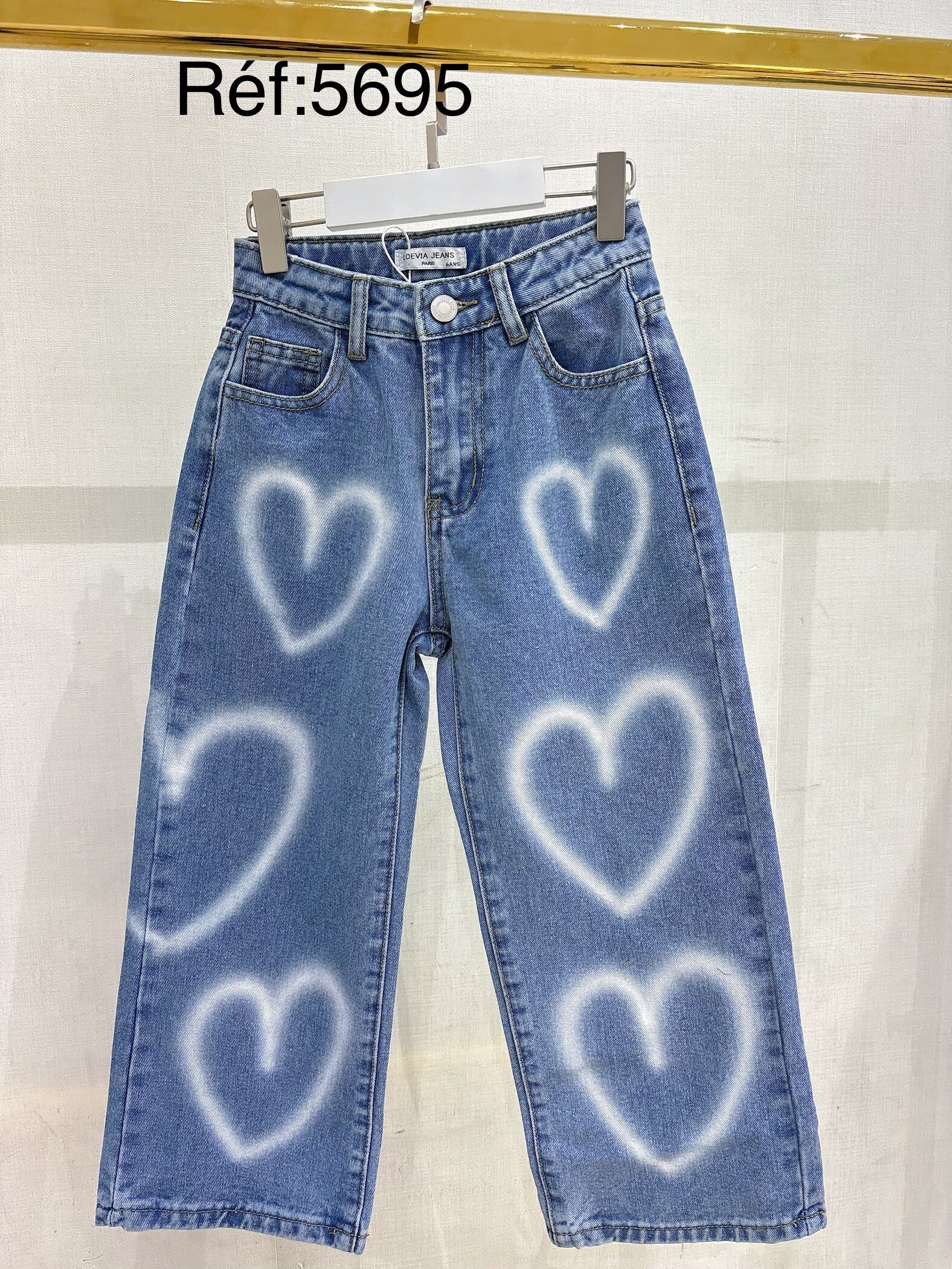 Grossiste LOEVIA - Pantalon jean fillette effet tag cœur blanc