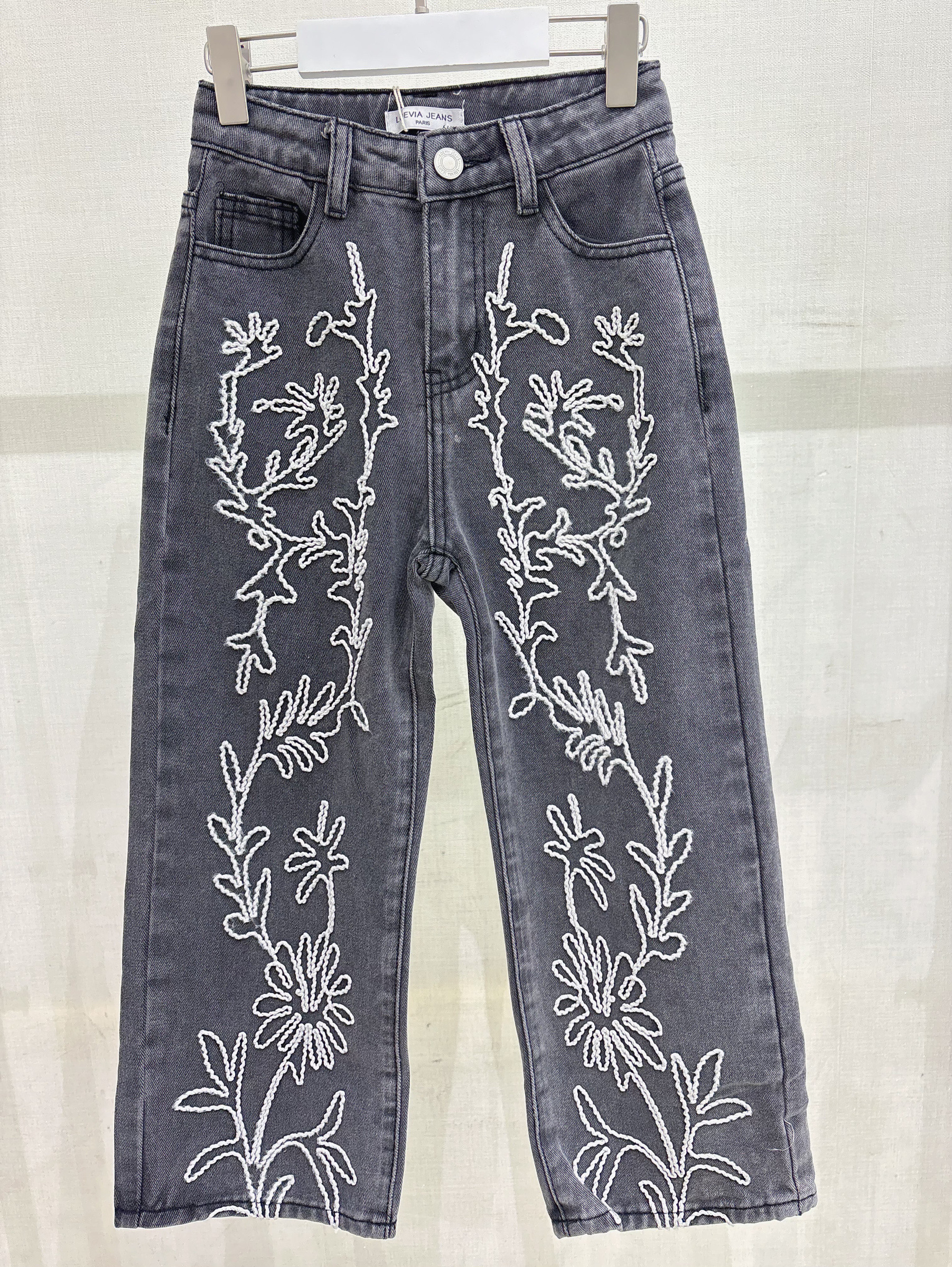 Grossiste LOEVIA - Pantalon jean fillette avec broderies florales