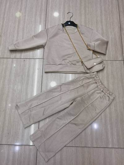Grossiste Mini Pomme - Ensemble top et pantalon avec sacoche Grossiste Mini Pomme - Ensemble top et pantalon avec sacoche