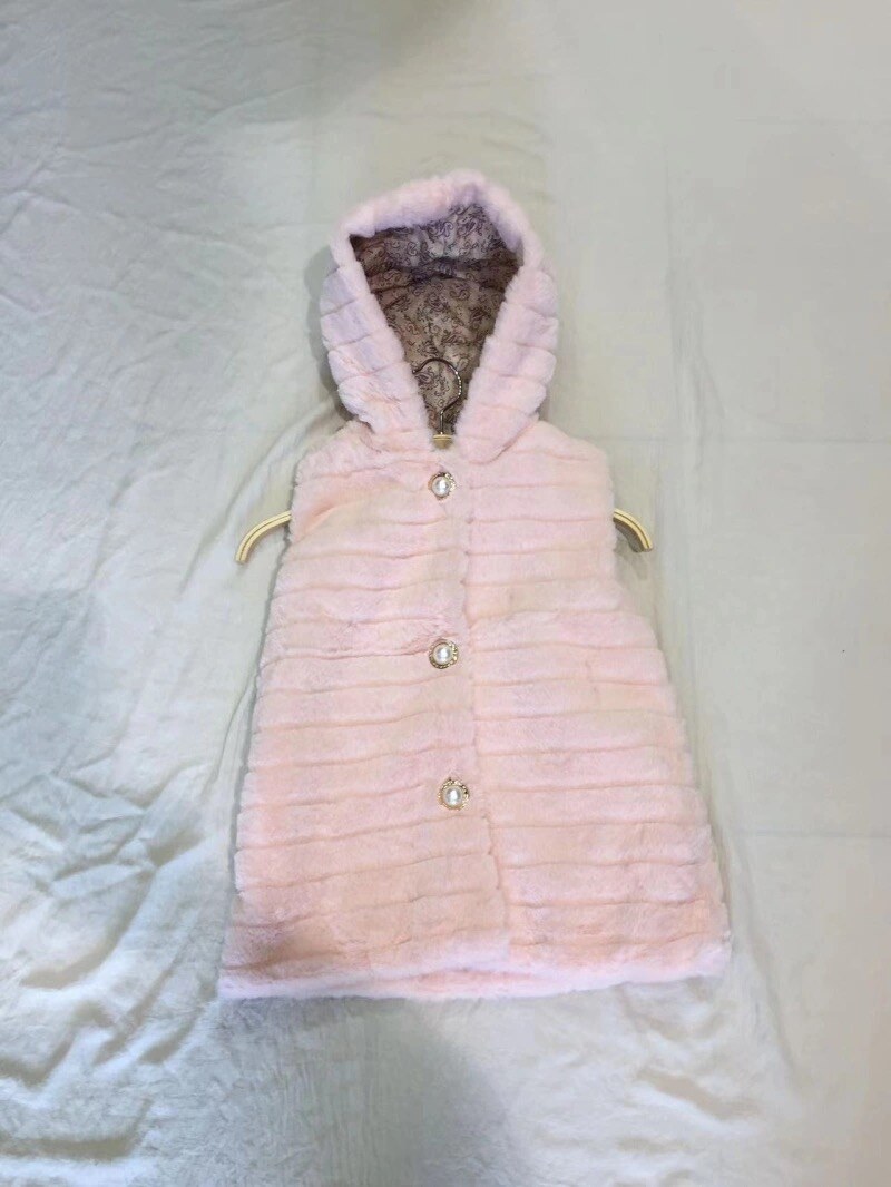 Grossiste PETITE ETOILE - Gilet fourrure sans manche avec capuche