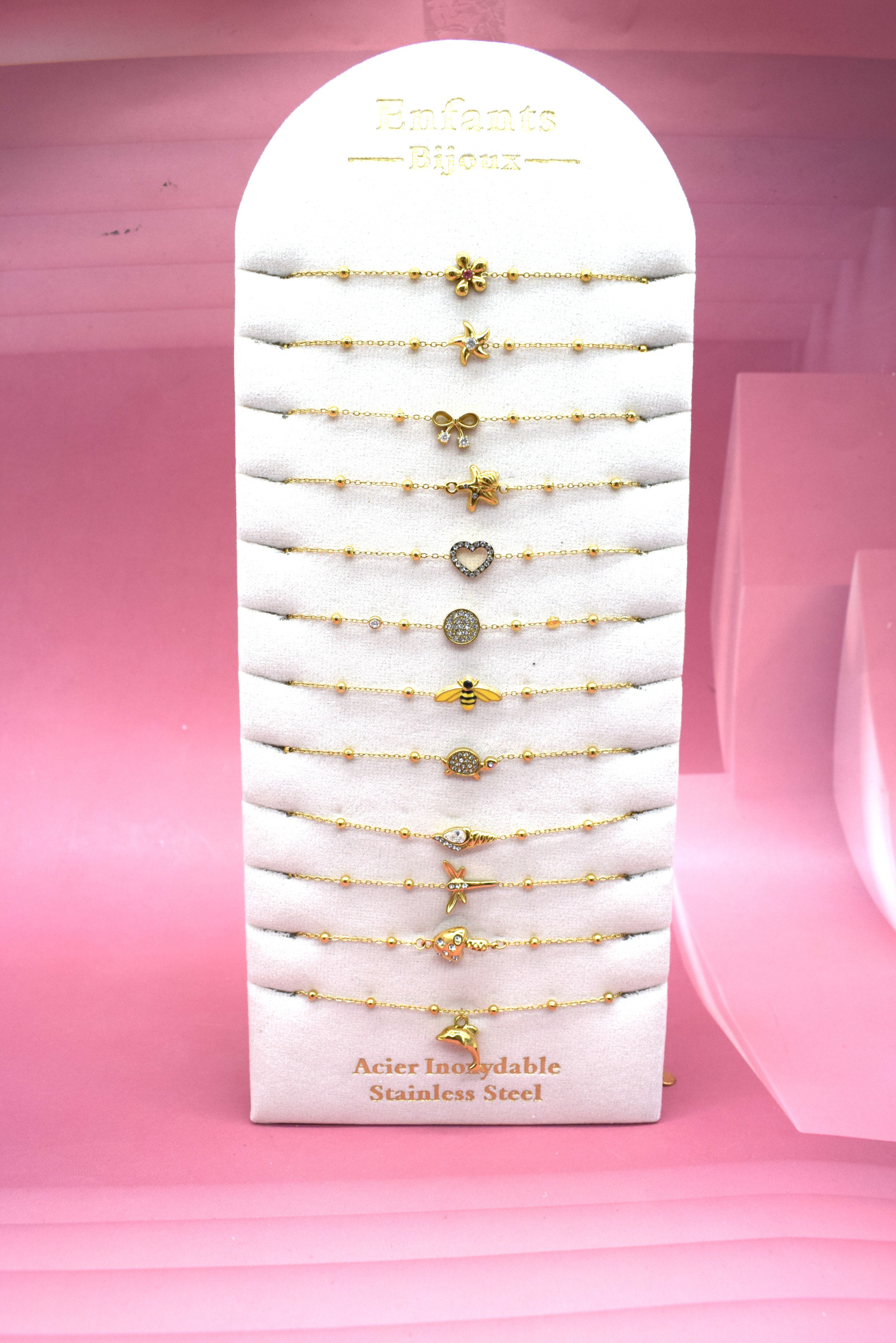 Grossiste Rouge Bonbons - LOT DE 12 BRACELETS enfants EN ACIER INOXYDABLE