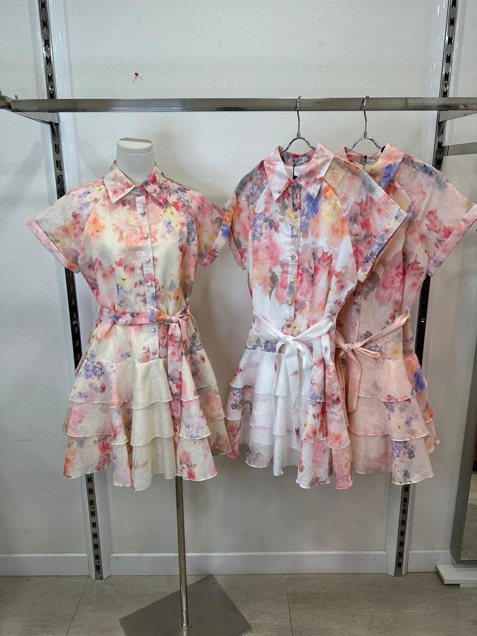 Light and elegant, this 100% polyester summer dress is ideal for the hot days of May. Made in China for the Spring/Summer 2025 collection.