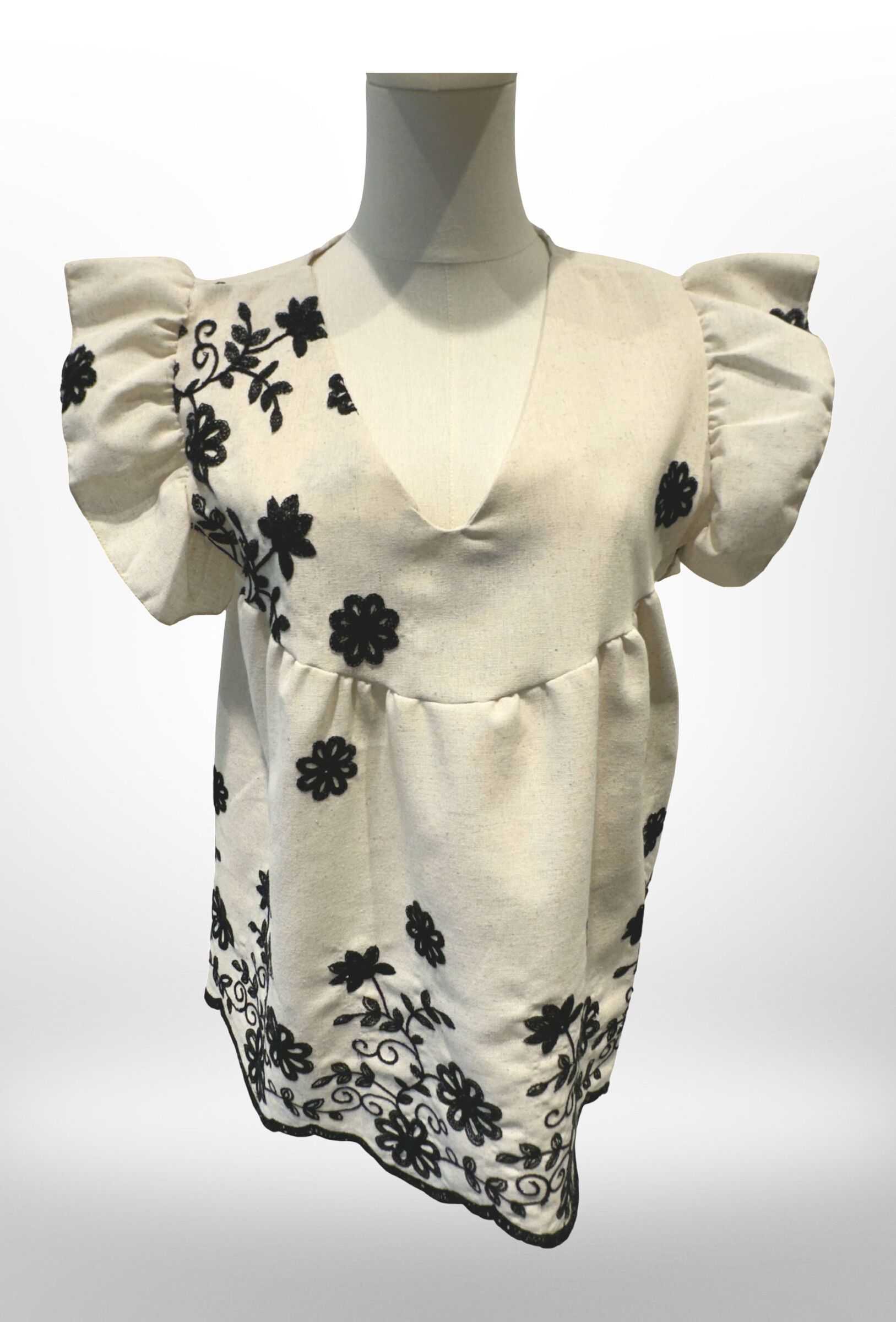 Grossiste AMARIA - Haut ecru manches courtes volant broderies florales