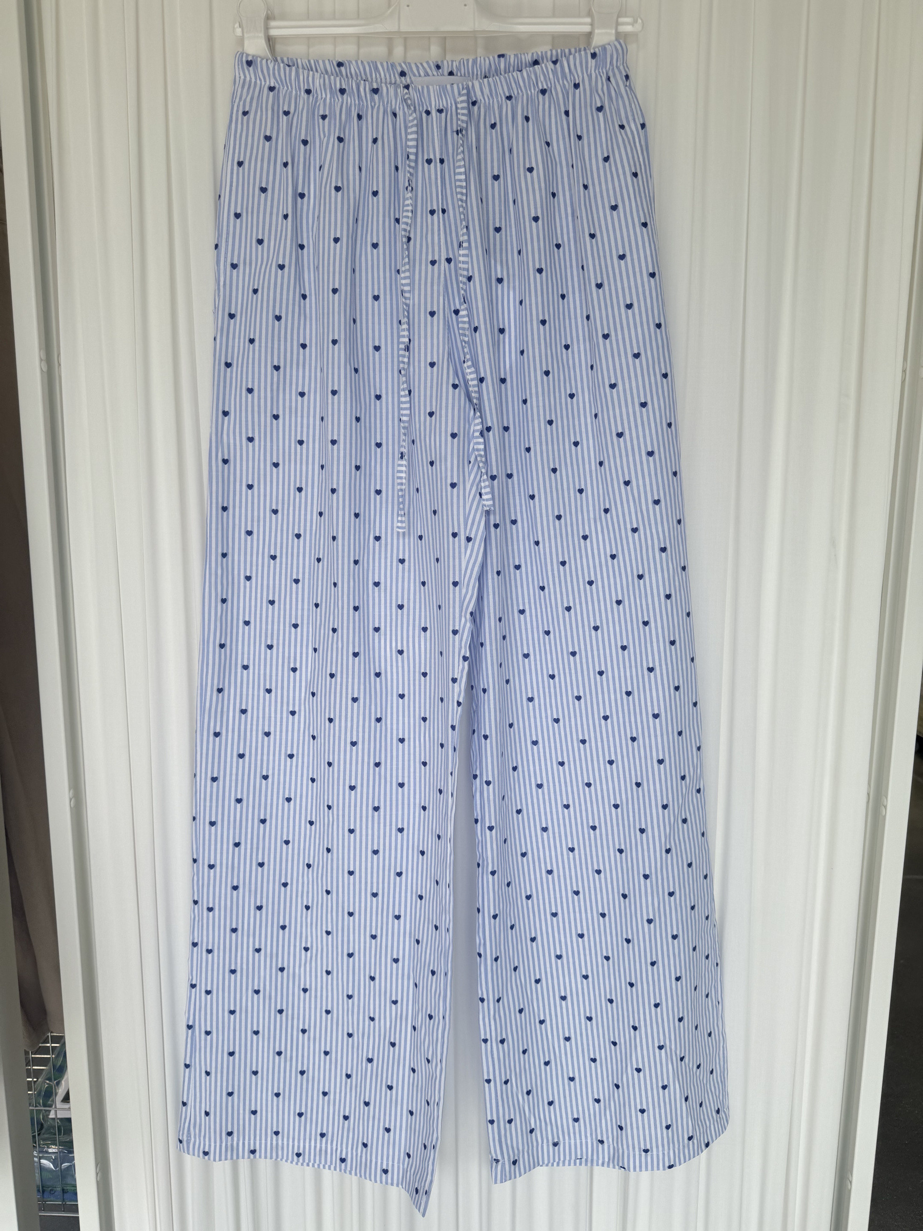 Wholesaler ARITA - Striped pants with heart print.