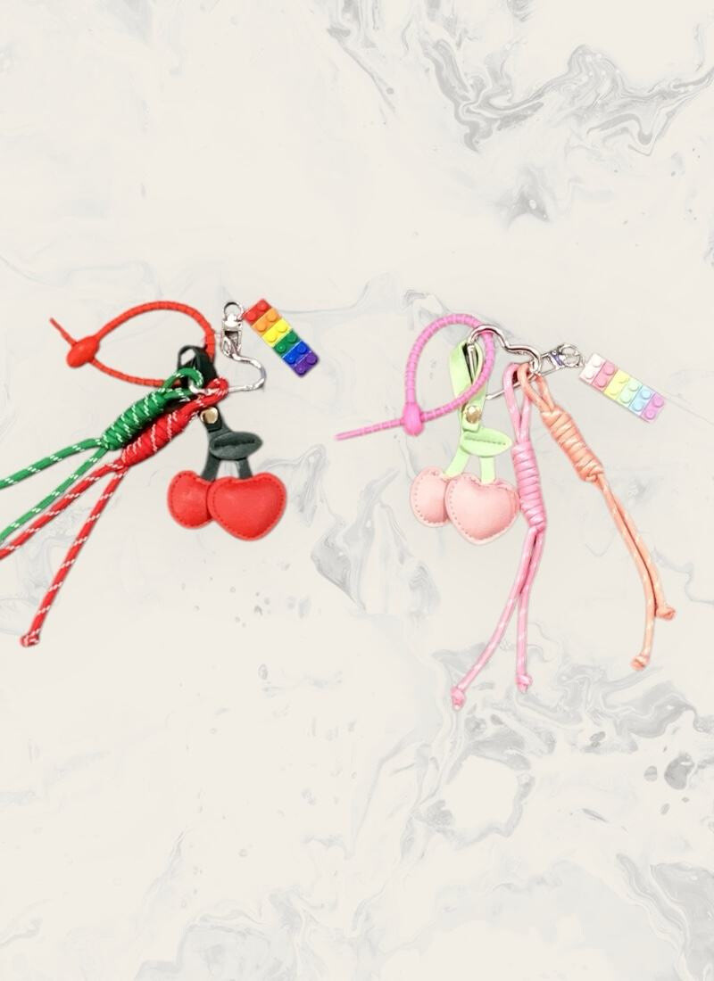 Grossiste Astra - Porte-clés fruits en cuir