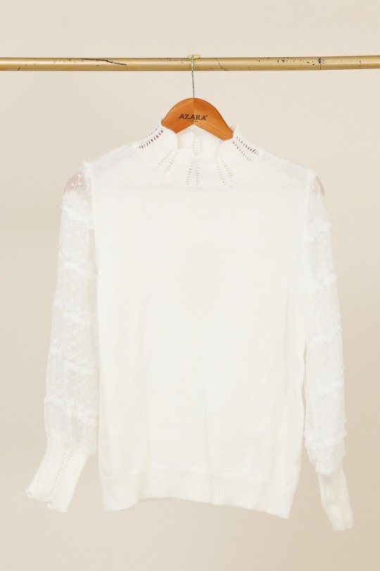 Pull féminin léger, idéal pour le printemps, en polyamide et viscose, fabriqué en Chine. Parfait pour la saison estivale 2026.