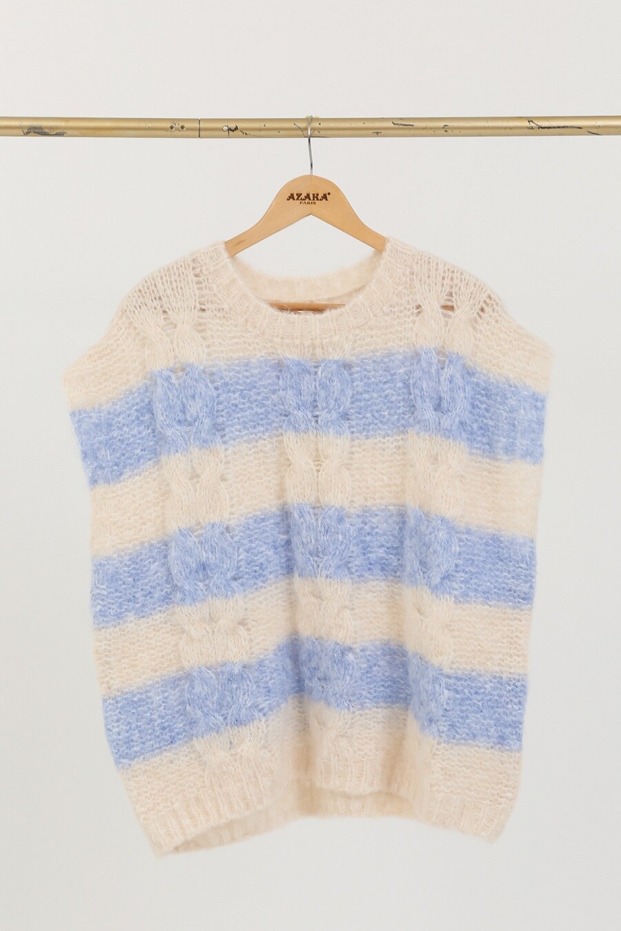 Lightweight women's sweater, perfect for spring, made of wool, polyamide, and polyester, made in China. Ideal for the mid-season.