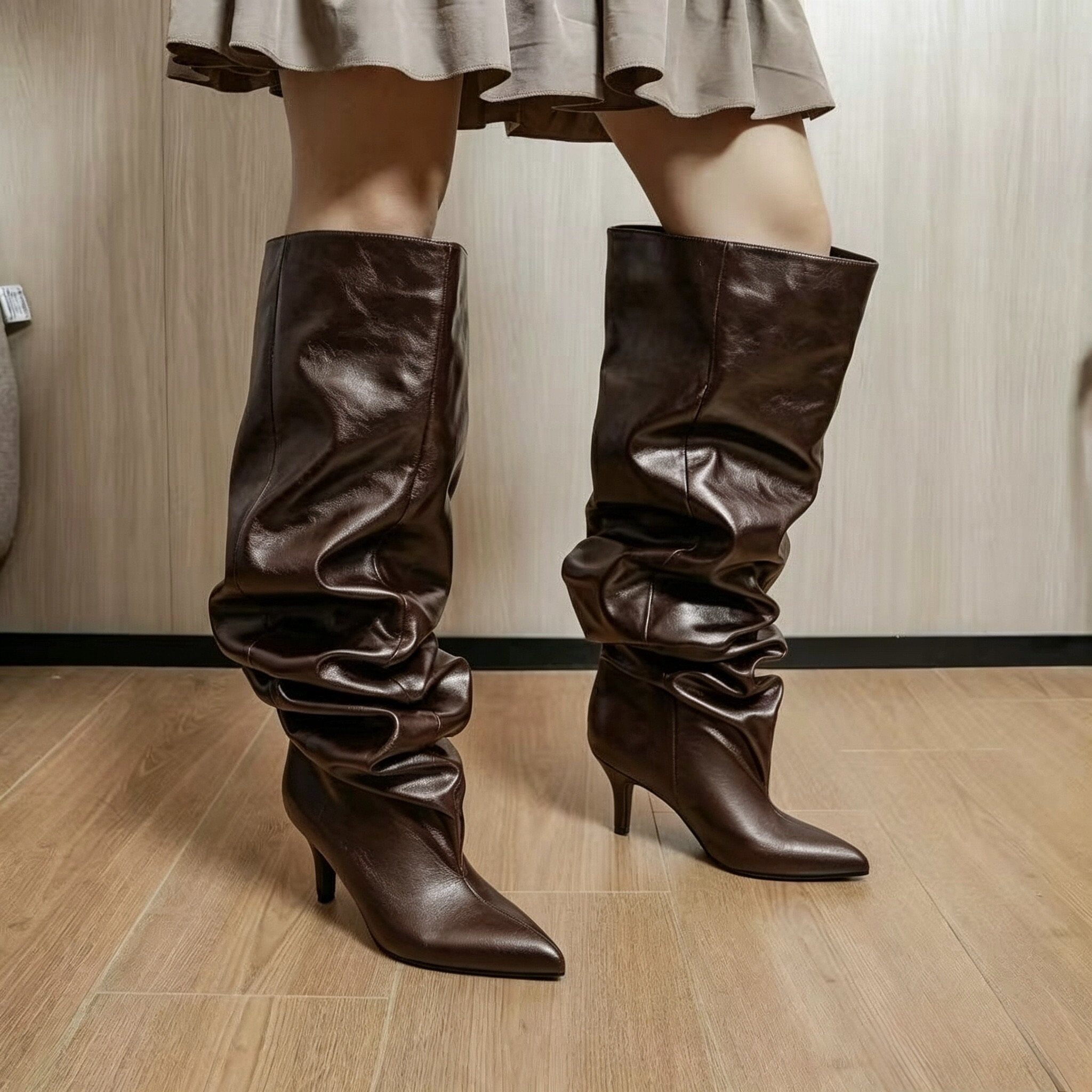 Wholesaler BEAVITA SHOES - Elegant glossy boots, featuring a trendy ruched design and a sleek silhouette with stiletto heel and pointed toe.