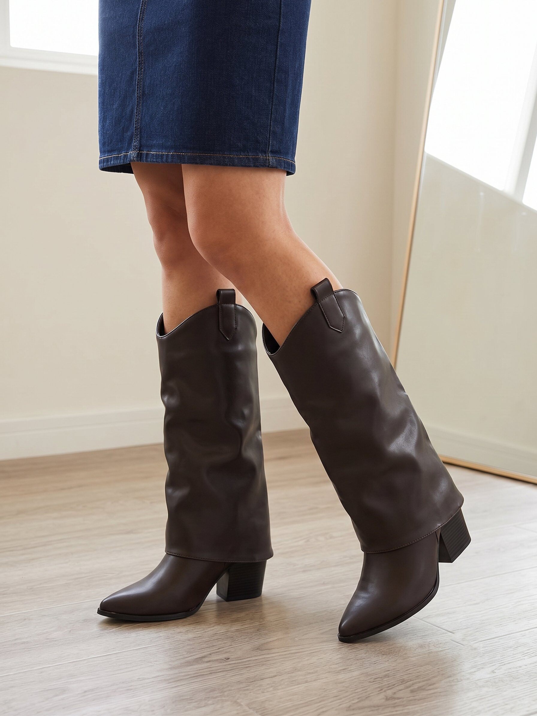Wholesaler BEAVITA SHOES - Mid-calf boots in faux leather, featuring a wide and structured silhouette. Perfect to pair with denim skirts, dresses, or shorts.