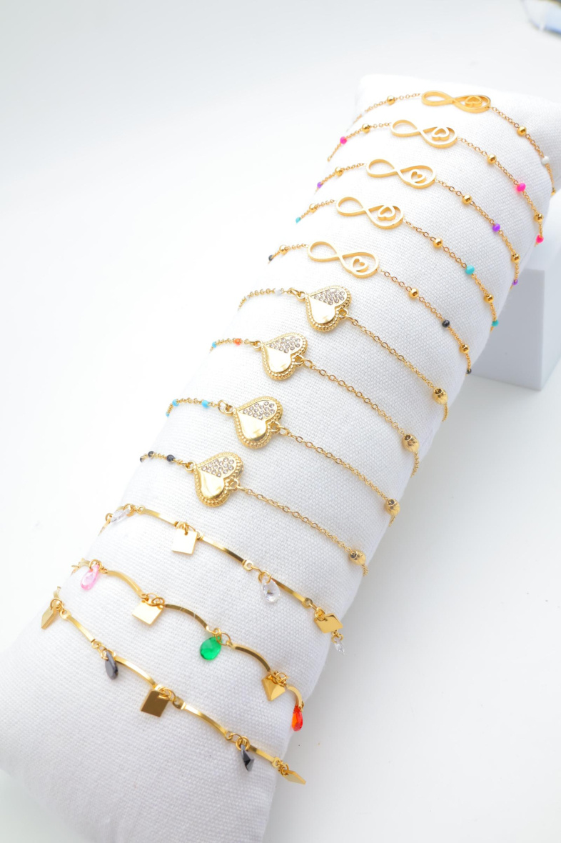 Grossiste Beli & Jolie - Lot de 12 bracelets en acier inoxydable avec coussin
