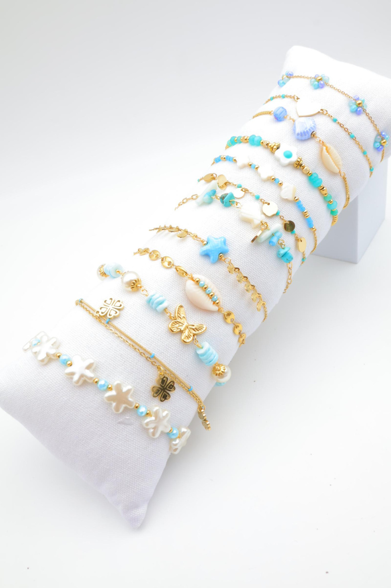 Grossista Beli & Jolie - Confezione di 12 braccialetti in acciaio inossidabile con cuscino