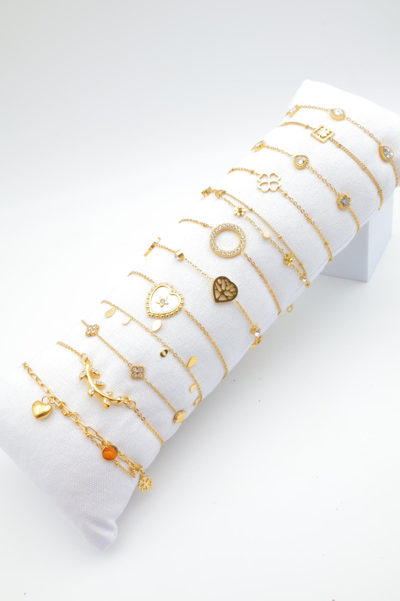 Grossista Beli & Jolie - Confezione di 12 braccialetti in acciaio inossidabile con cuscino