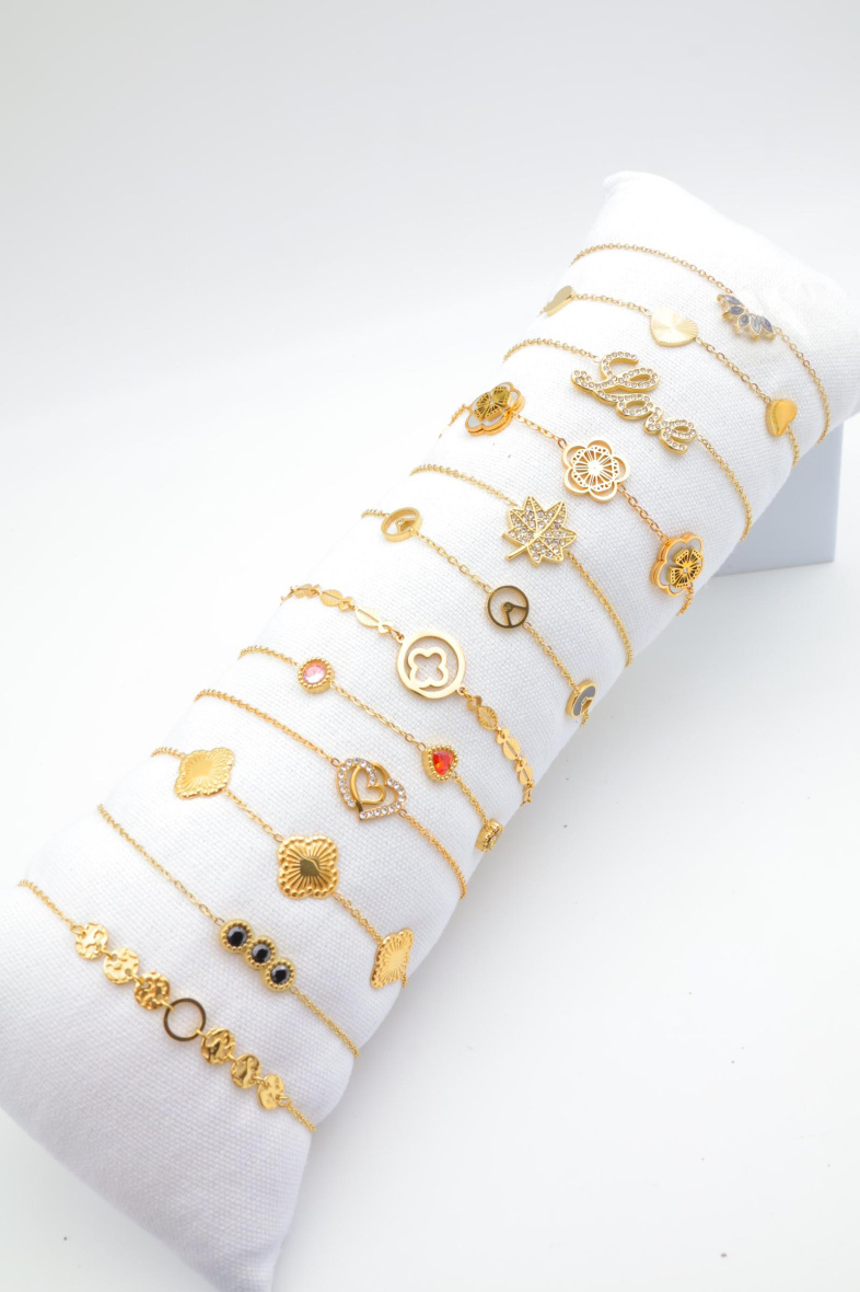 Grossista Beli & Jolie - Confezione di 12 braccialetti in acciaio inossidabile con cuscino