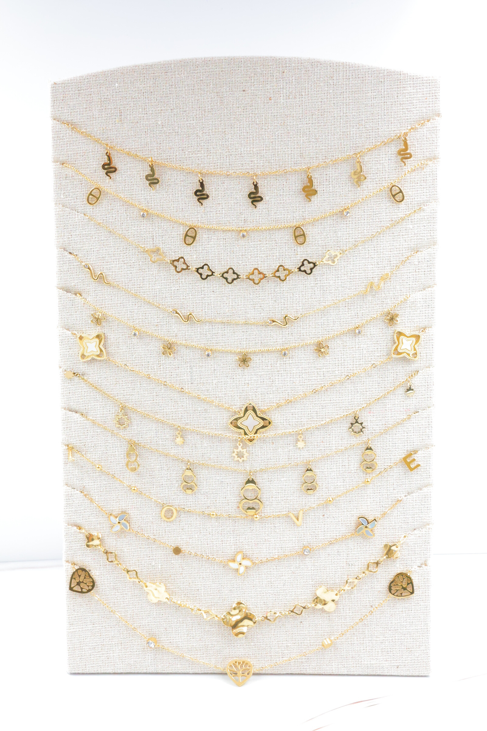 Grossista Beli & Jolie - Set di 12 collane in acciaio inossidabile con espositore