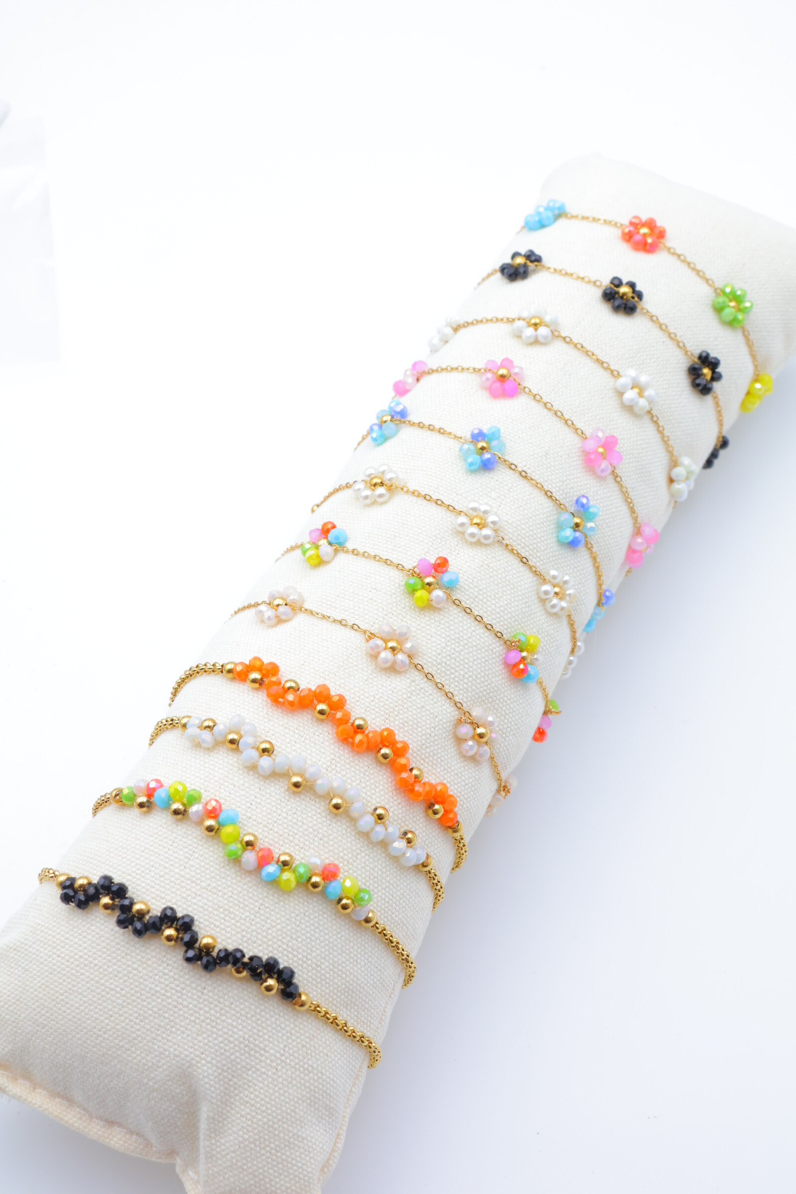 Grossista Beli & Jolie - Set di 12 braccialetti in acciaio inossidabile con cuscino