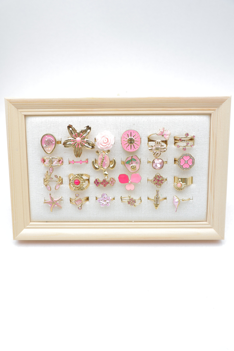 Mayorista Beli & Jolie - Juego de 24 anillos en marco de madera