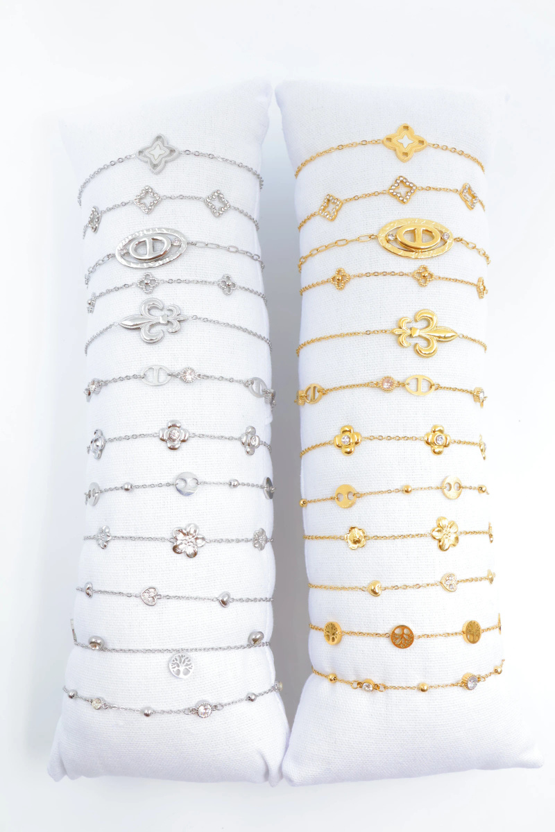 Grossiste Beli & Jolie - Lot de 12 bracelets en acier inoxydable avec coussin
