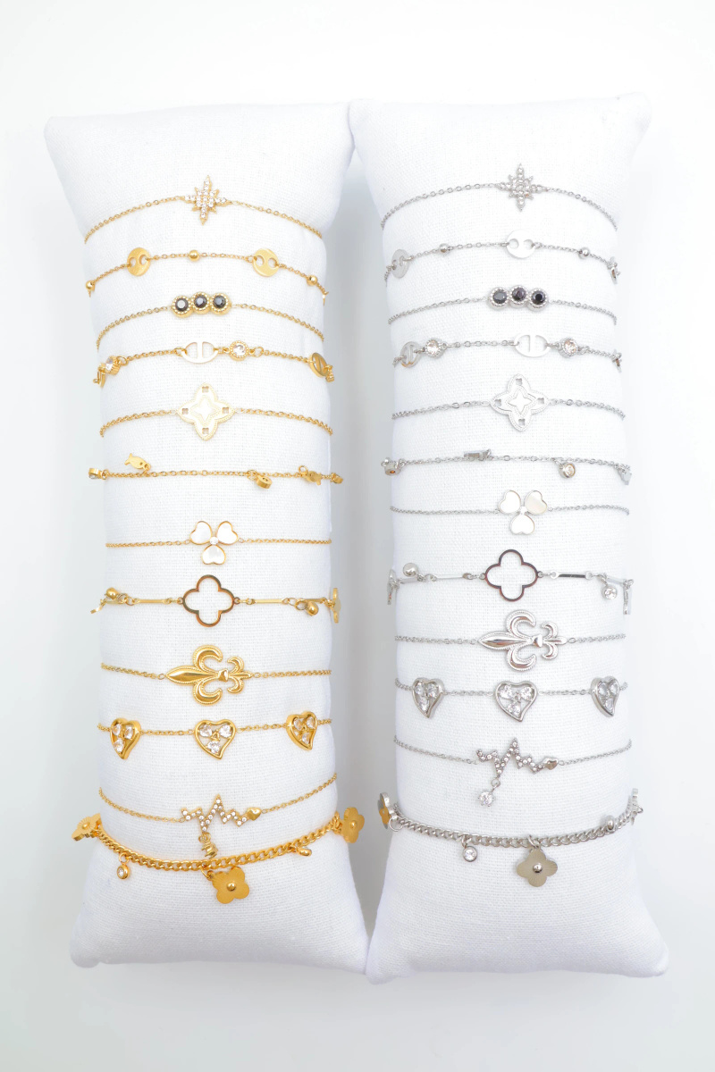Grossiste Beli & Jolie - Lot de 12 bracelets en acier inoxydable avec coussin