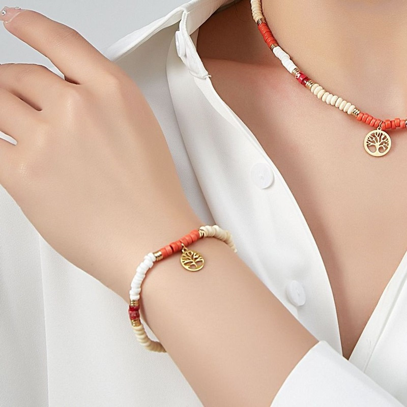 Grossiste BELLE MISS - bracelet elastique avec pierres et pendentif