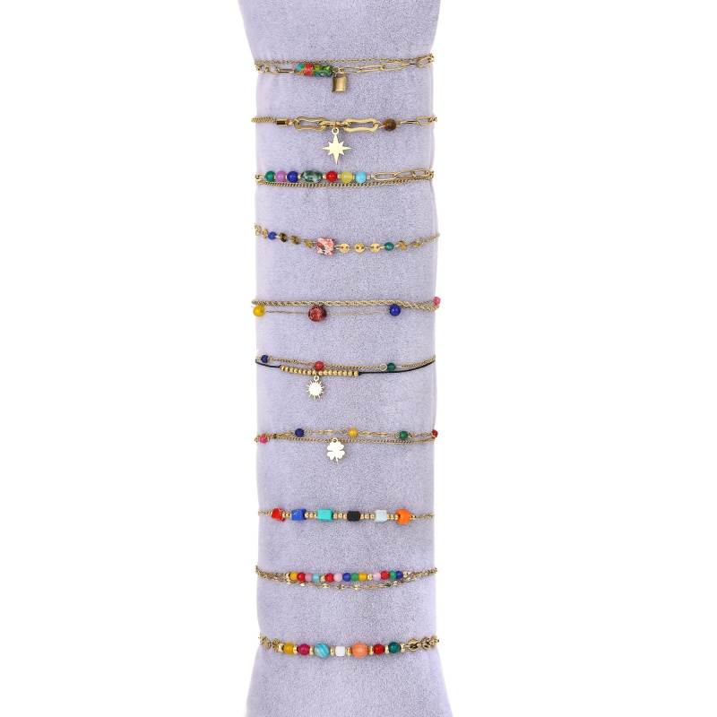 Mayorista BELLE MISS - Juego de 10 pulseras de acero dorado con piedra de colores y cristal.