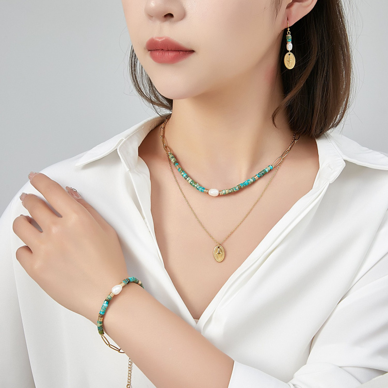 Grossiste BELLE MISS - Collier double rangs en acier doré et perle