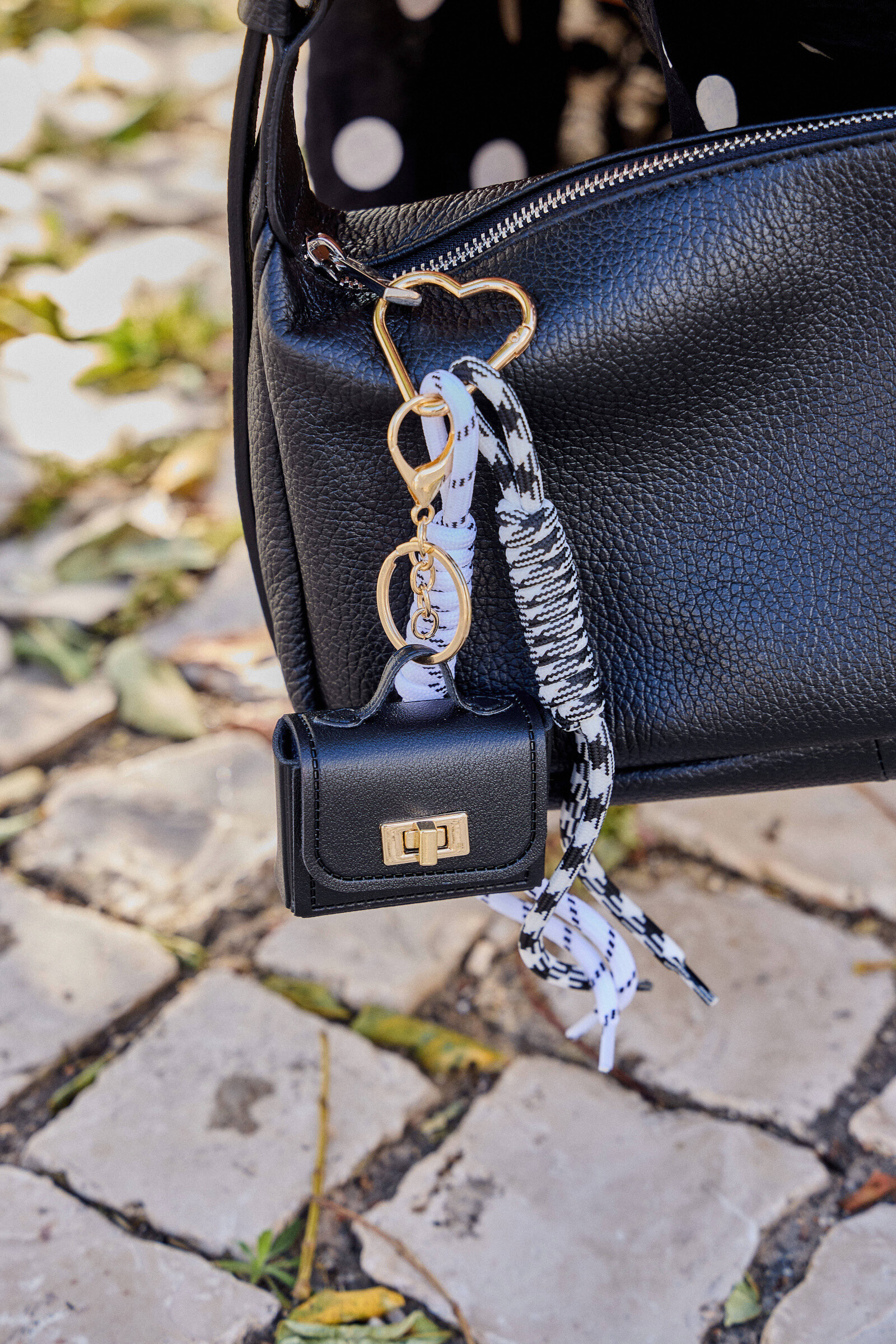 Mayorista Bellissima - Bag Grigri & Key Case Heads-elegancia y practicante diario