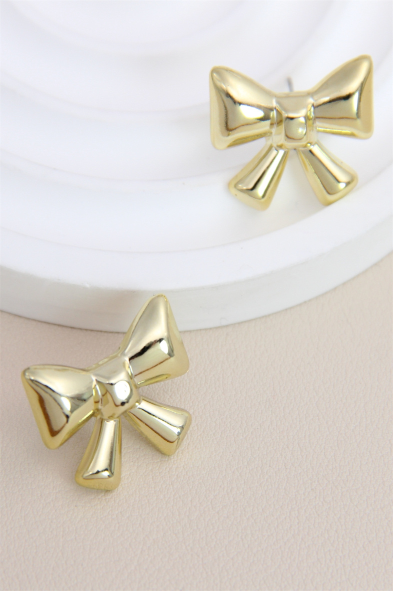 Grossiste Bellissima - Boucle d'oreille acier inoxydable nœud de papillon en résine