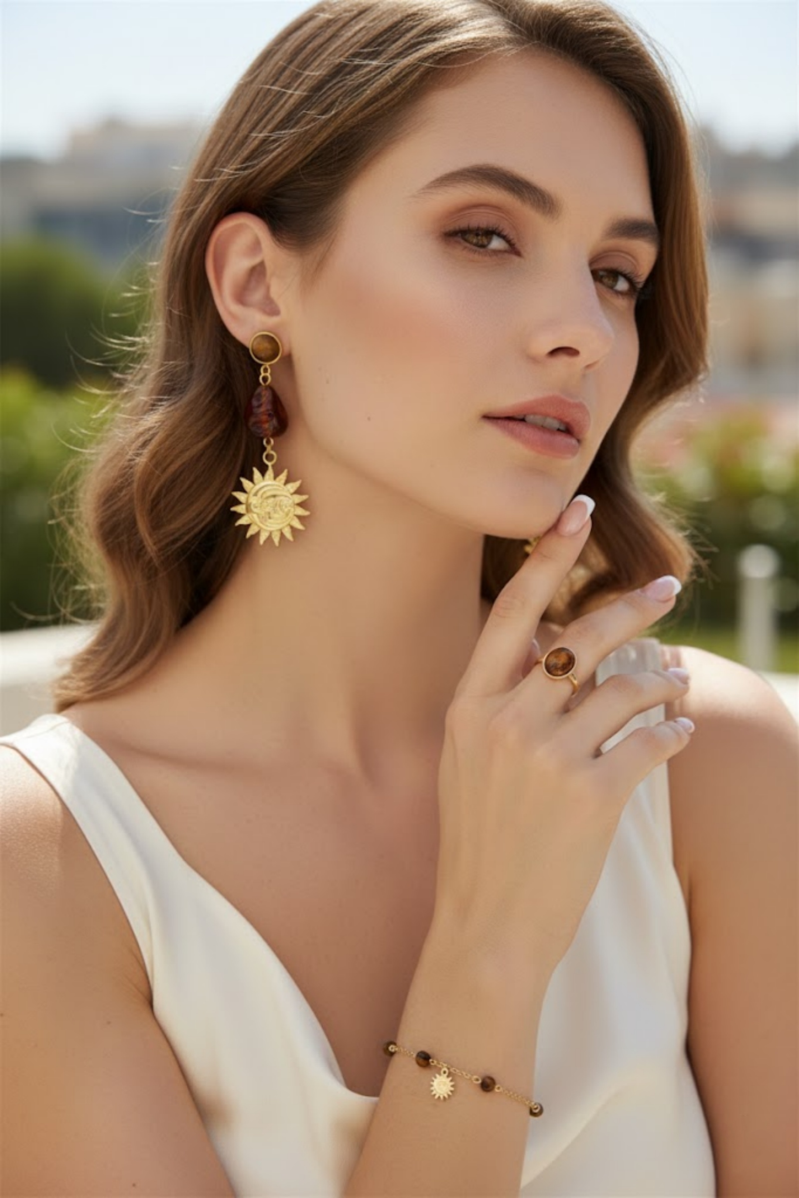 Grossiste Bellissima - Boucles d’oreilles soleil résine effet ambre acier inoxydable